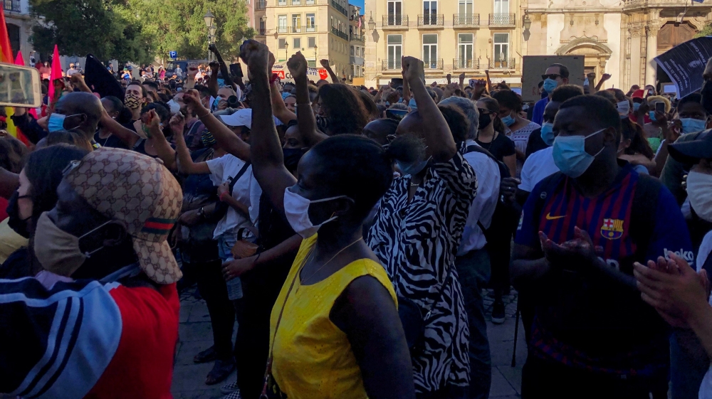 People take part in an anti-racism protest in honour of Bruno Cande in Lisbon