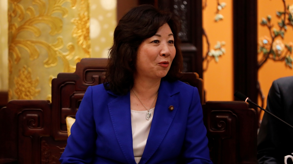 Seiko Noda speaks to Chinese Foreign Minister Wang Yi (not pictured) at the Diaoyutai State Guesthouse in Beijing, China