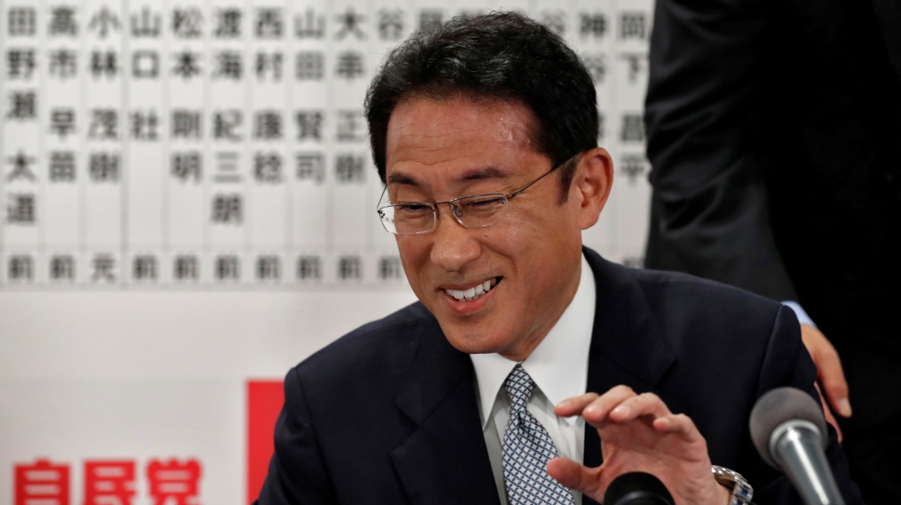 Japan’s governing Liberal Democratic Party (LDP) policy chief at the time, Fumio Kishida smiles as he adresses the media after Japan’s 2017 lower house election at the LDP headquarters in Tokyo