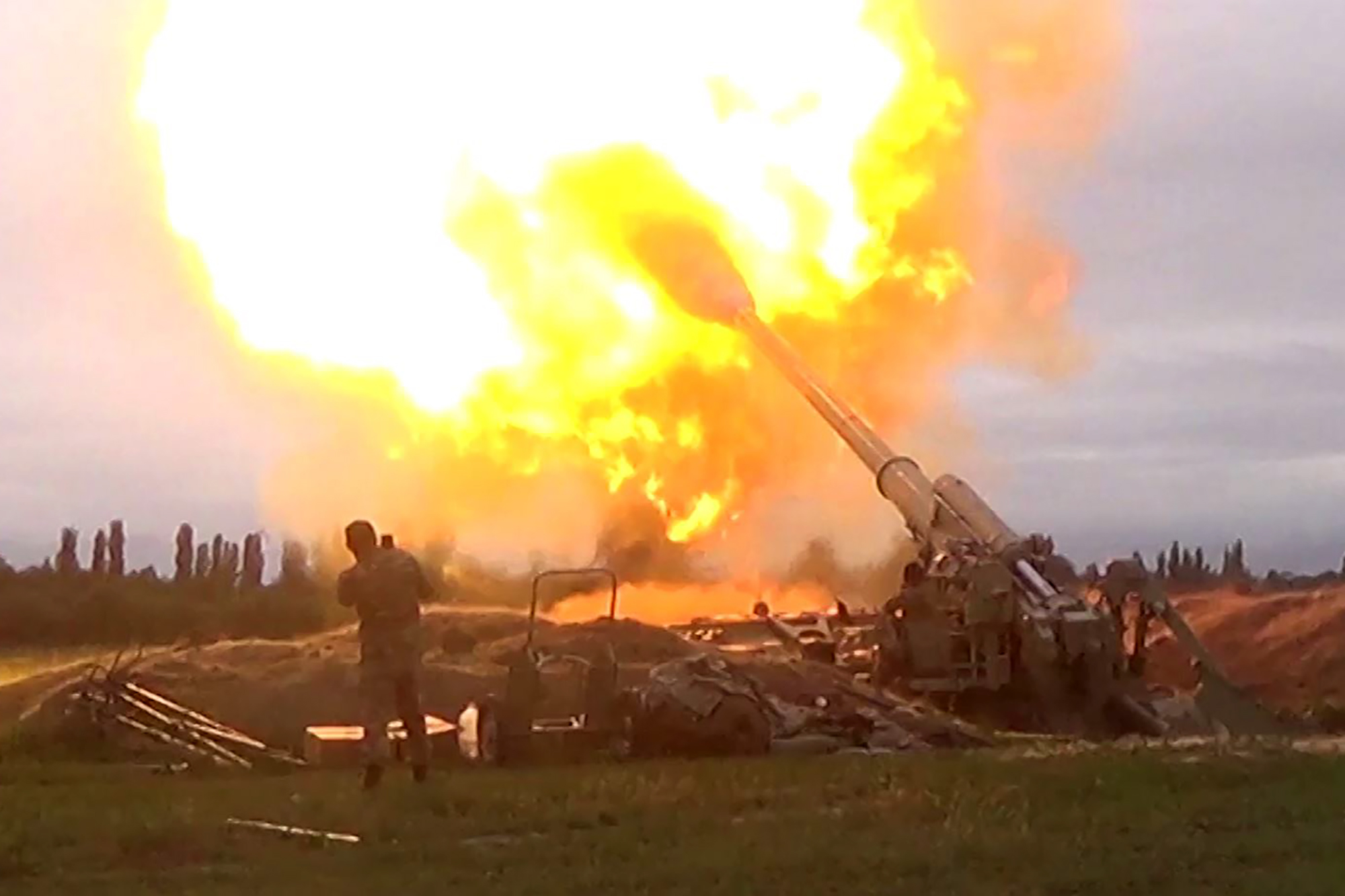An image grab taken from a video made available on the official website of the Azerbaijani Defence Ministry on September 28, 2020, allegedly shows Azerbaijani artillery attacks towards the positions of Armenian separatists in the breakaway region of Nagorno-Karabakh
