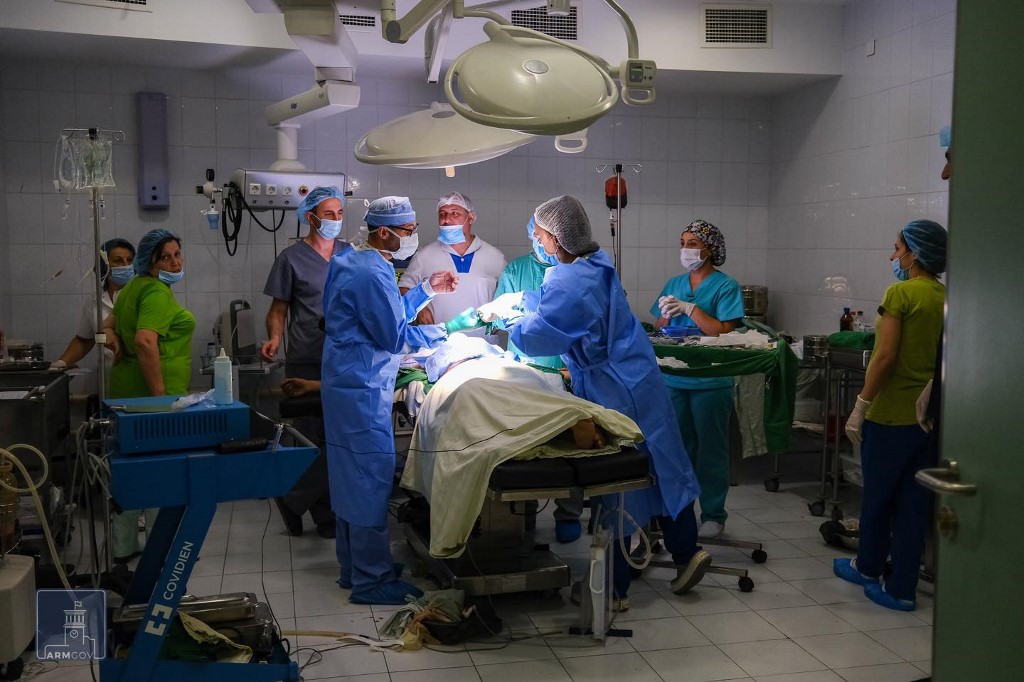 Medics operate on a person said to have been injured during clashes over the Nagorny-Karabakh region, at a hospital in Nagorno-Karabakh’s main city of Stepanakert