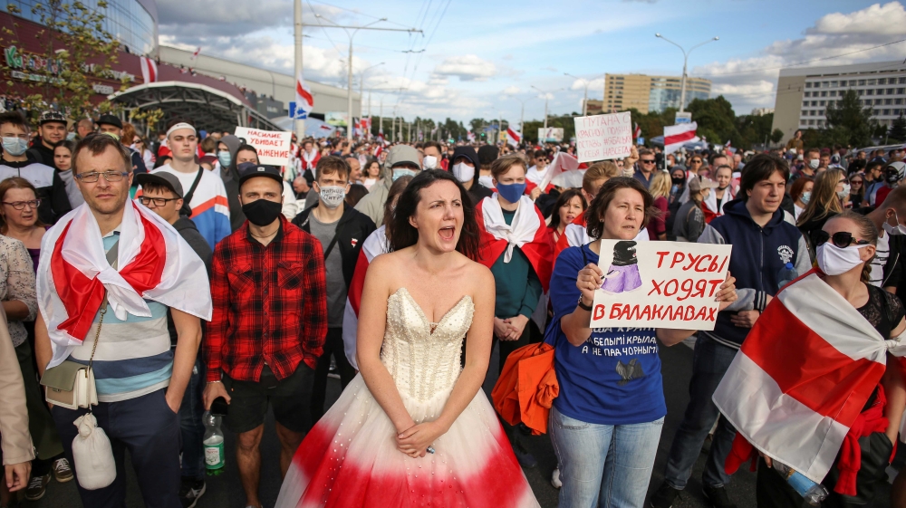 Opposition supporters take part in a rally against police brutality following protests t