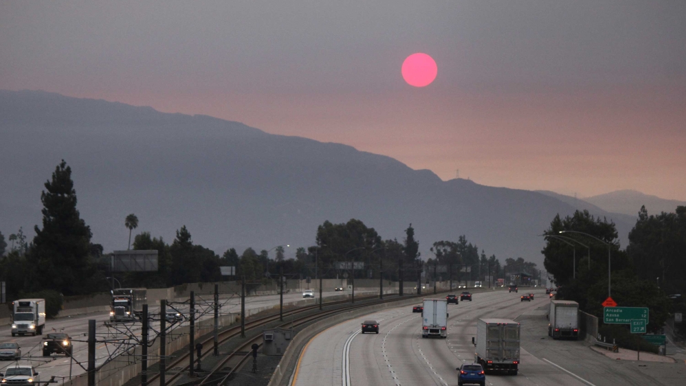 Smoke from wildfires burning east of Los Angeles dimming the sunrise on Monday, September 7, 2020