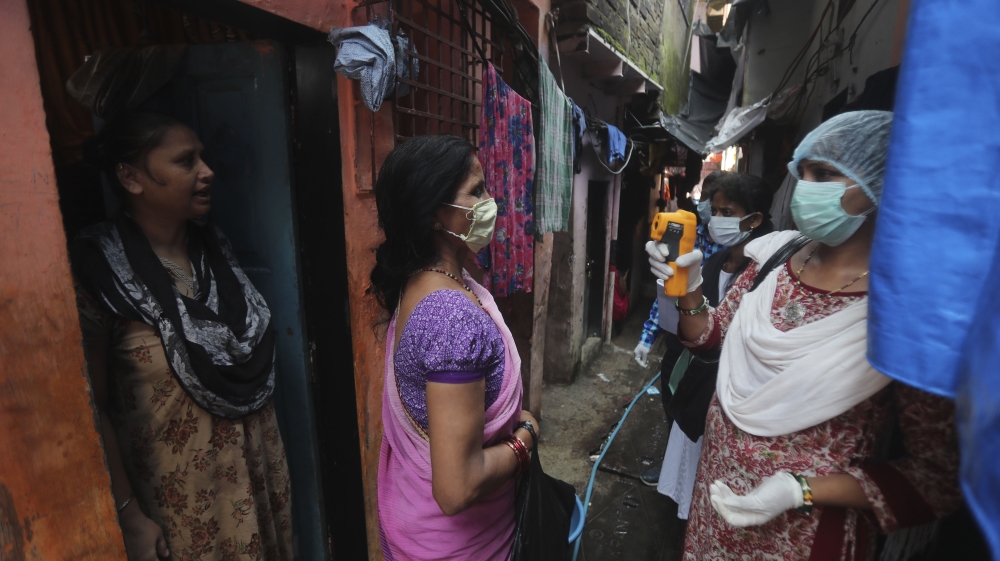 The number of deaths in India from the COVID-19 rose by more than 1,000 to 69,561 [AP]
