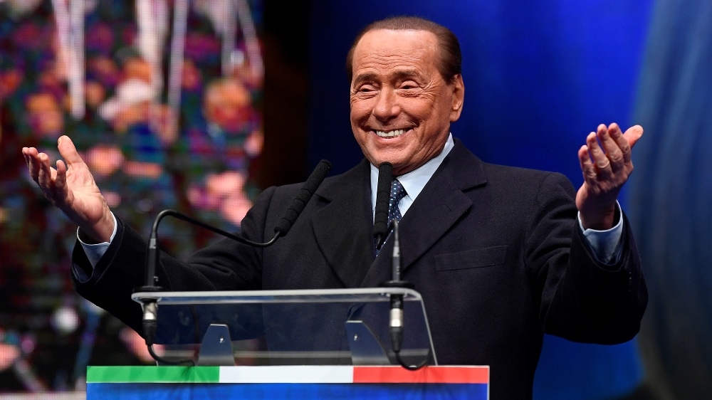 Former Italian prime minister and leader of the Forza Italia party, Silvio Berlusconi, gestures during a rally ahead of a regional election in Emilia-Romagna, in Ravenna