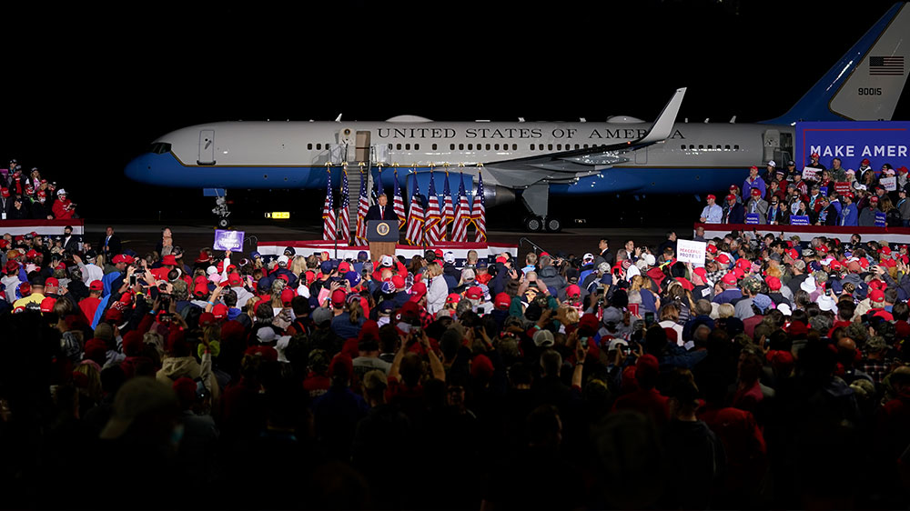 President Donald Trump speaks at a campaign rally at the Central Wisconsin Airport in Mosinee, Wisconsin.