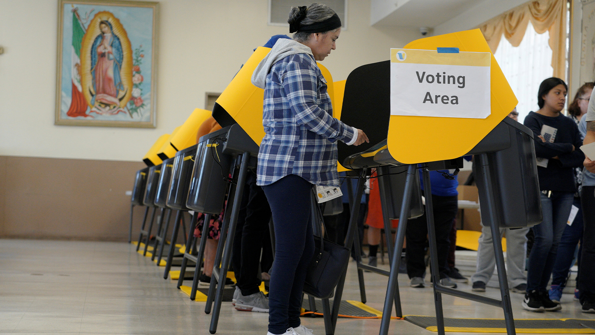 Voters make their choice for a Democratic presidential nominee during Super Tuesday elections at a polling station in the Boyle Heights neighbourhood of Los Angeles, California on March 3, 2020