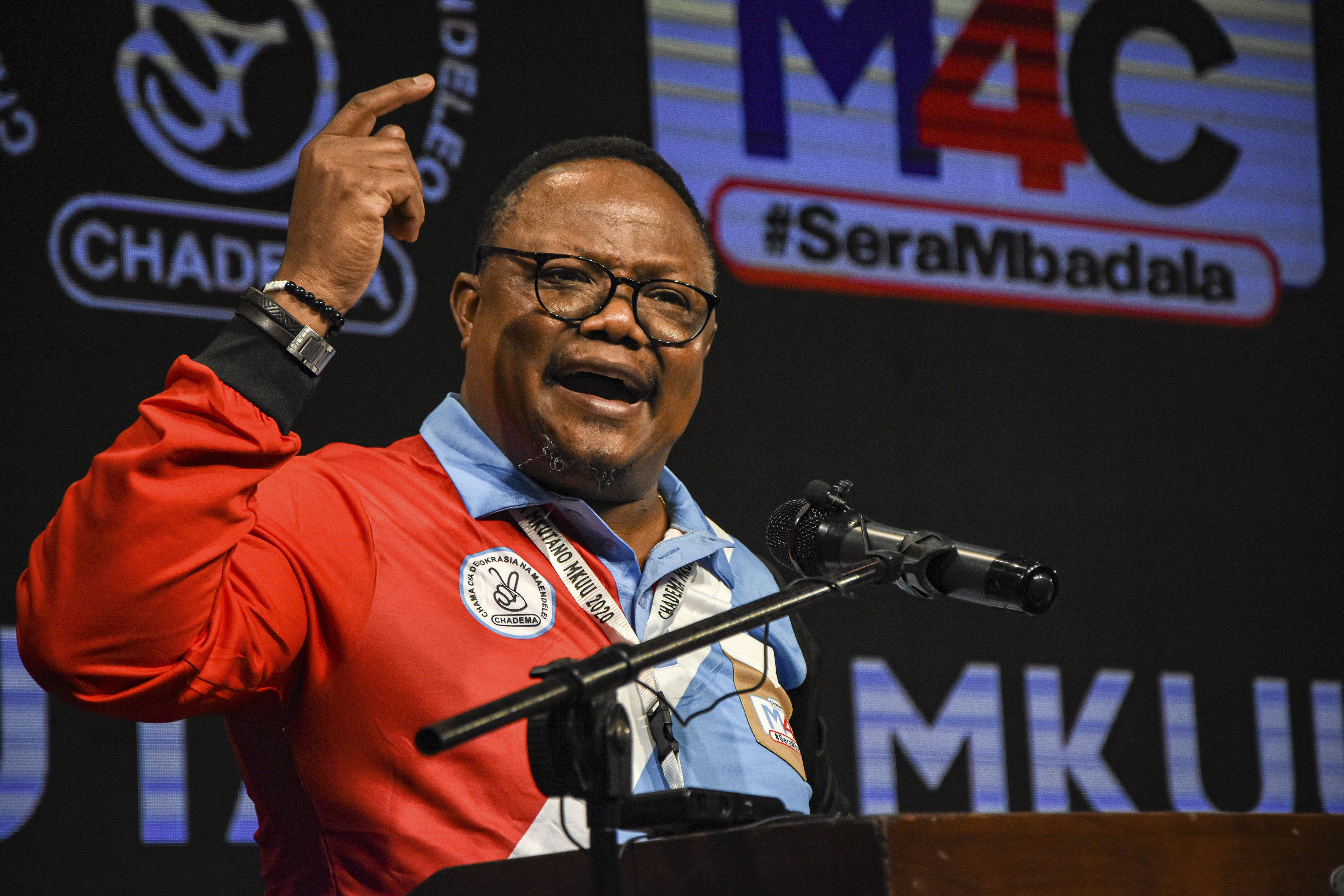 Chadema party’s Tundu Lissu is hoping to cause an upset by beating Magufuli, the ruling party candidate [AFP]
