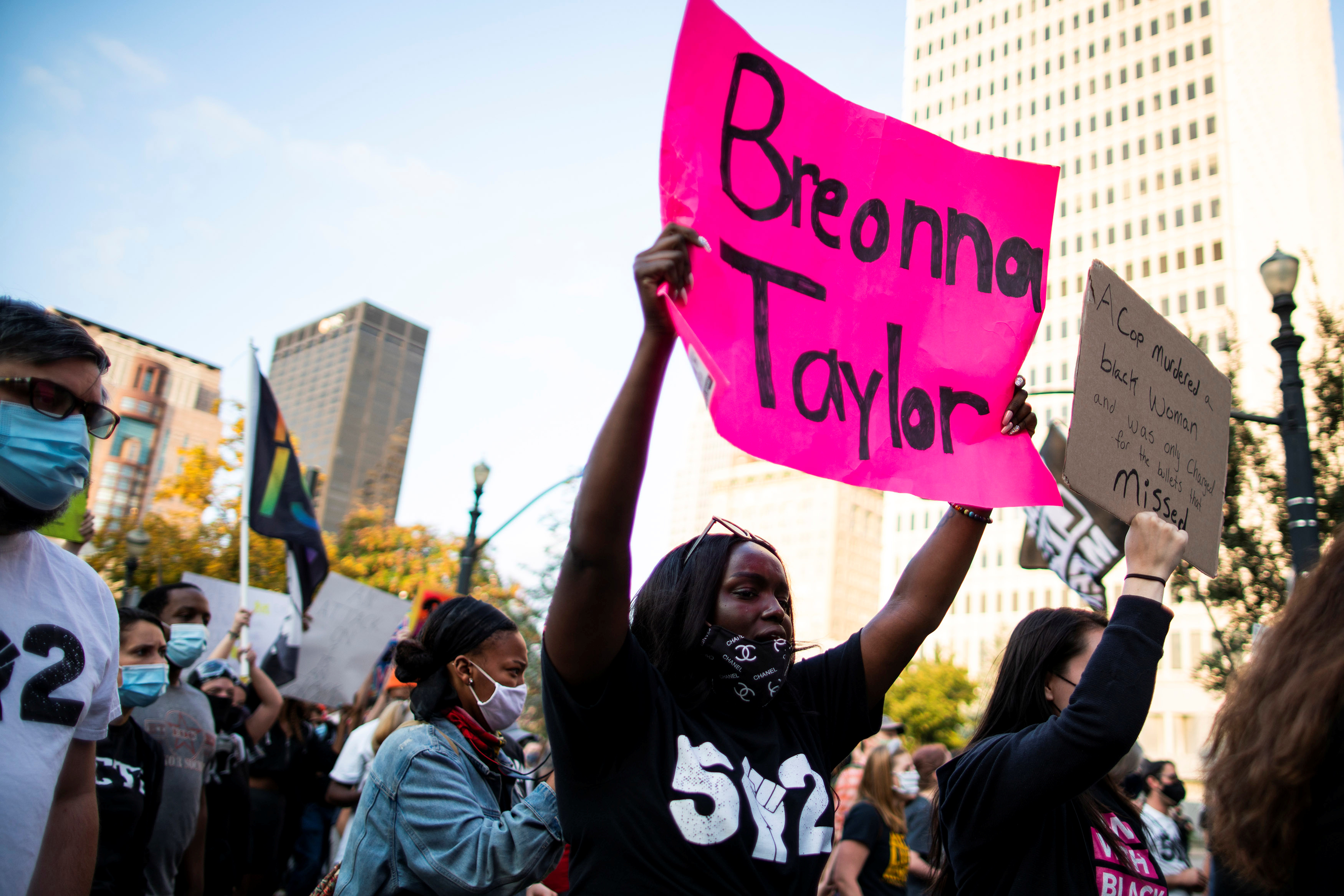 Protesters march during a peaceful protest after a grand jury decided not to bring homicide charges against police officers involved in the fatal shooting of Breonna Taylor, in Louisville, Kentucky September 26, 2020