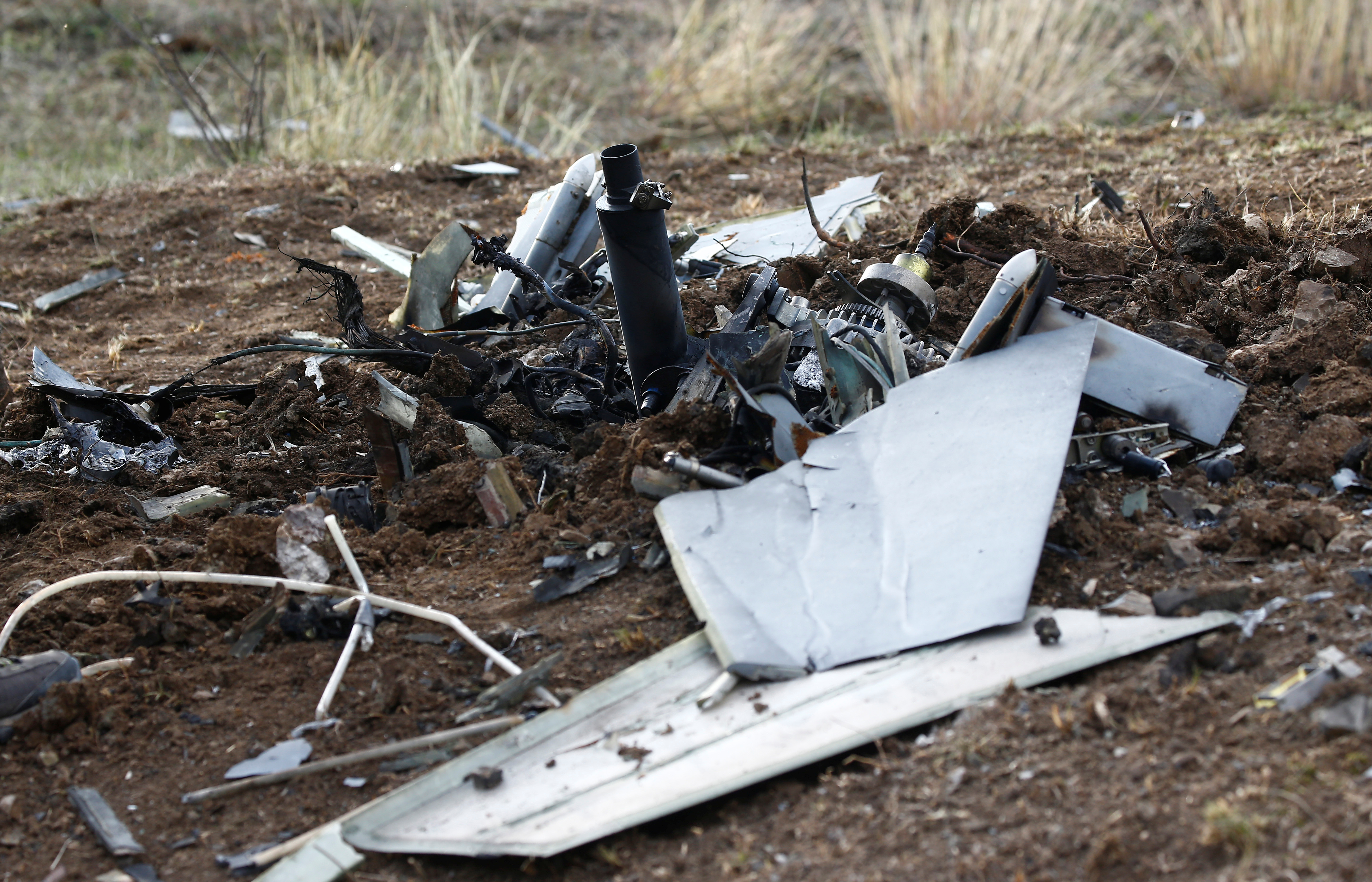 The remains of an unmanned aerial vehicle are pictured on the outskirts of Stepanakert during the military conflict over the breakaway Nagorno-Karabakh region, October 11, 2020