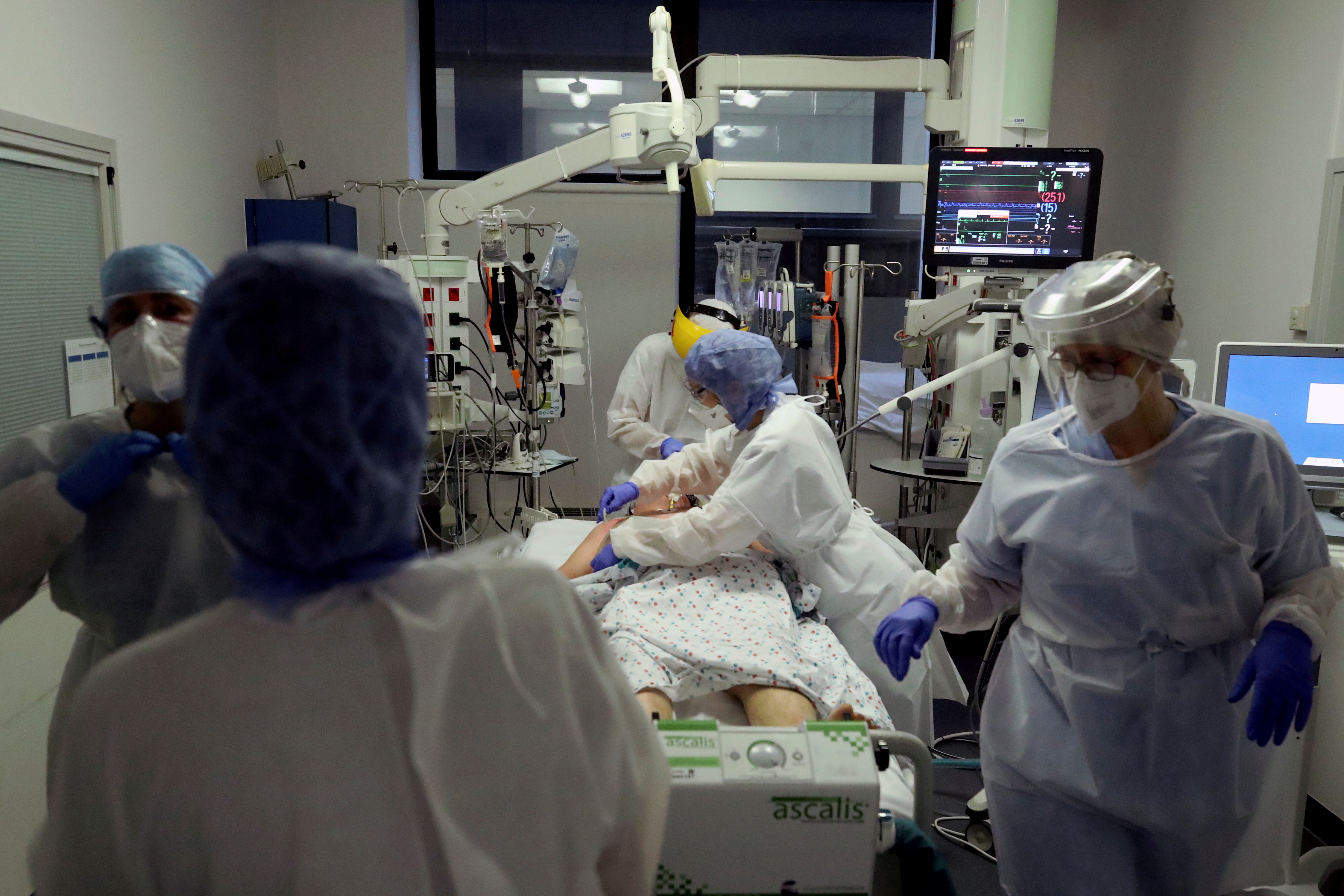 Medical personnel treat a patient suffering from COVID-19 in the ICU at the CHIREC Braine l’Alleud-Waterloo Hospital, Belgium