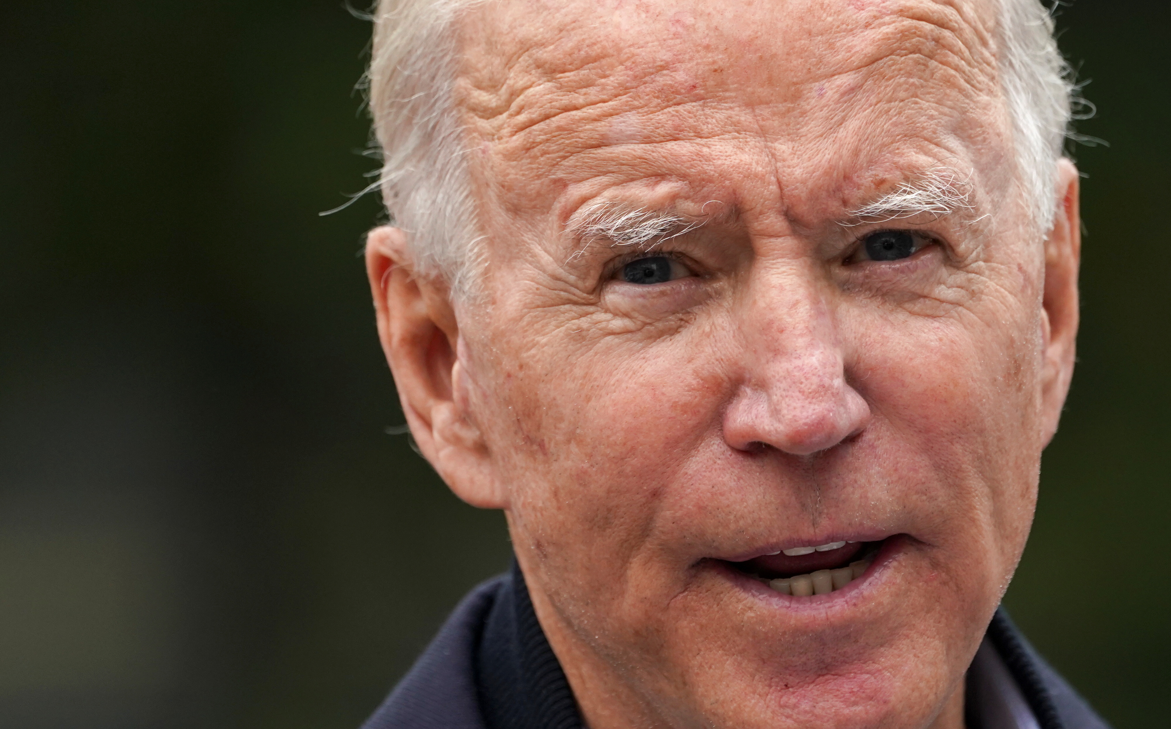 Democratic presidential candidate Joe Biden slams Trump’s claims about DOVID-19 during a visit to a voter activation center in Chester, Pennsylvania