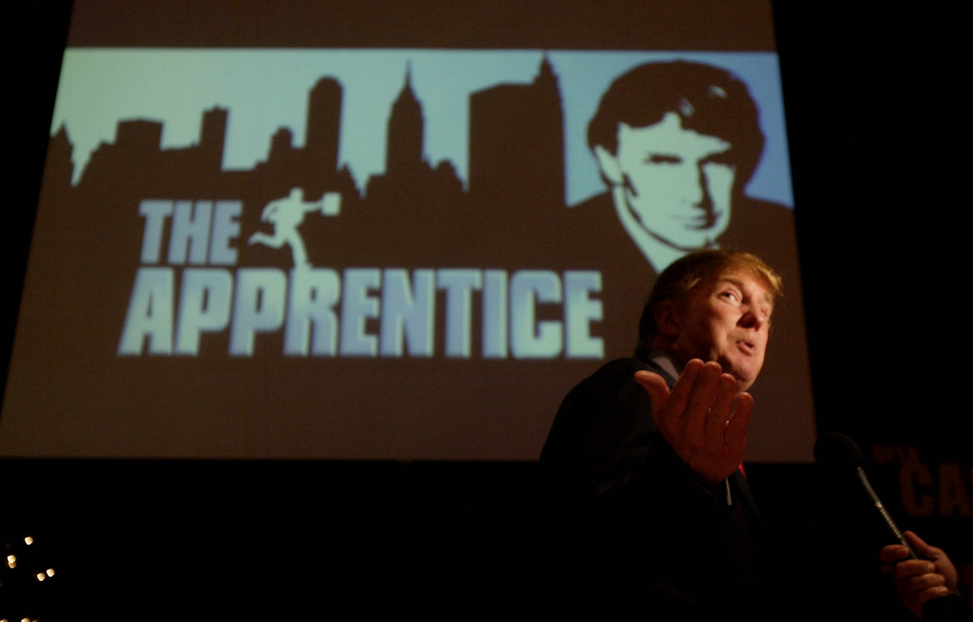 Donald Trump, seeking contestants for “The Apprentice” television show, is interviewed at Universal Studios Hollywood, July 9, 2004