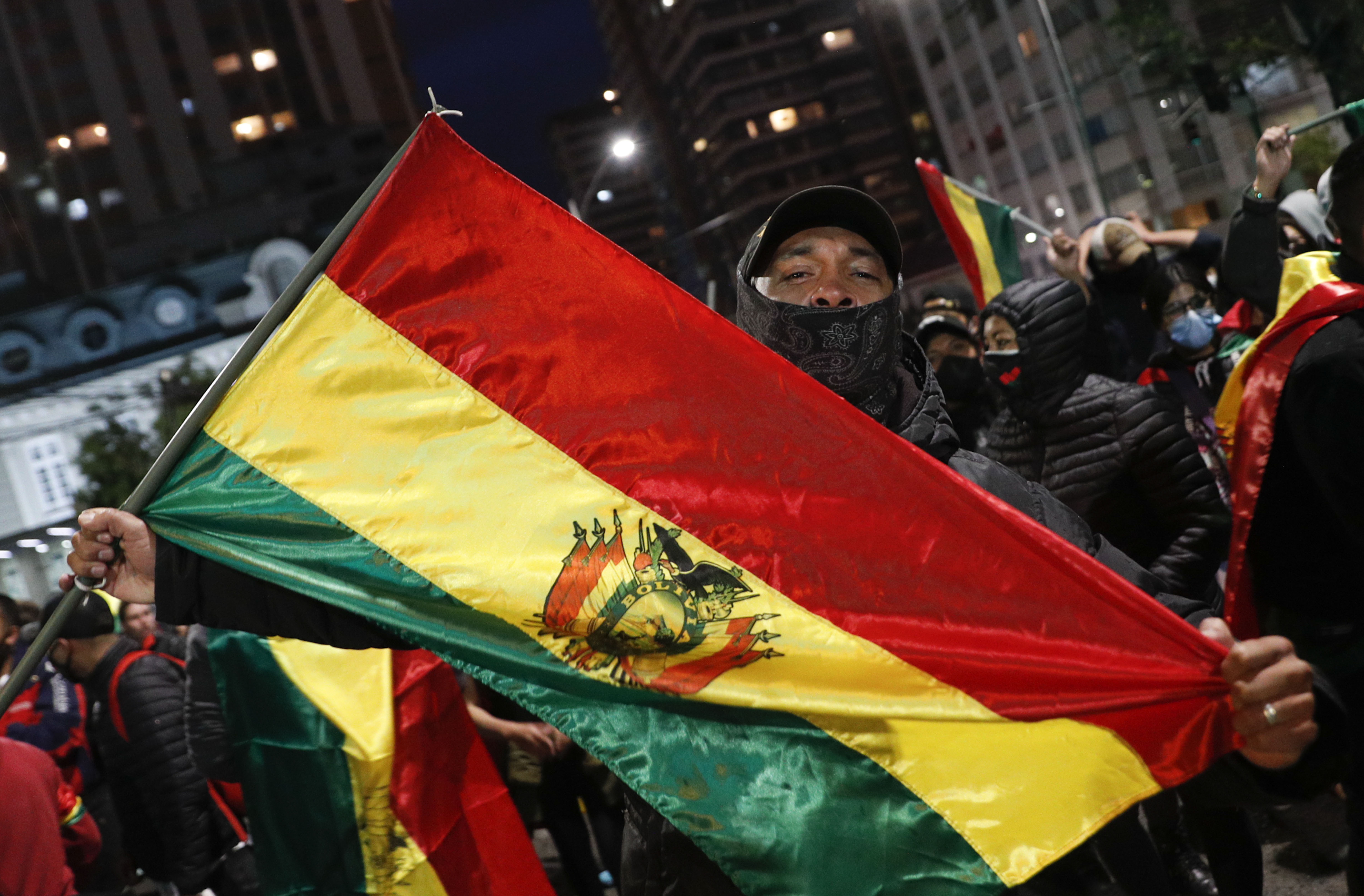 Opposition members taking part in a protest against Luis Arce’s victory, in La Paz, Bolivia