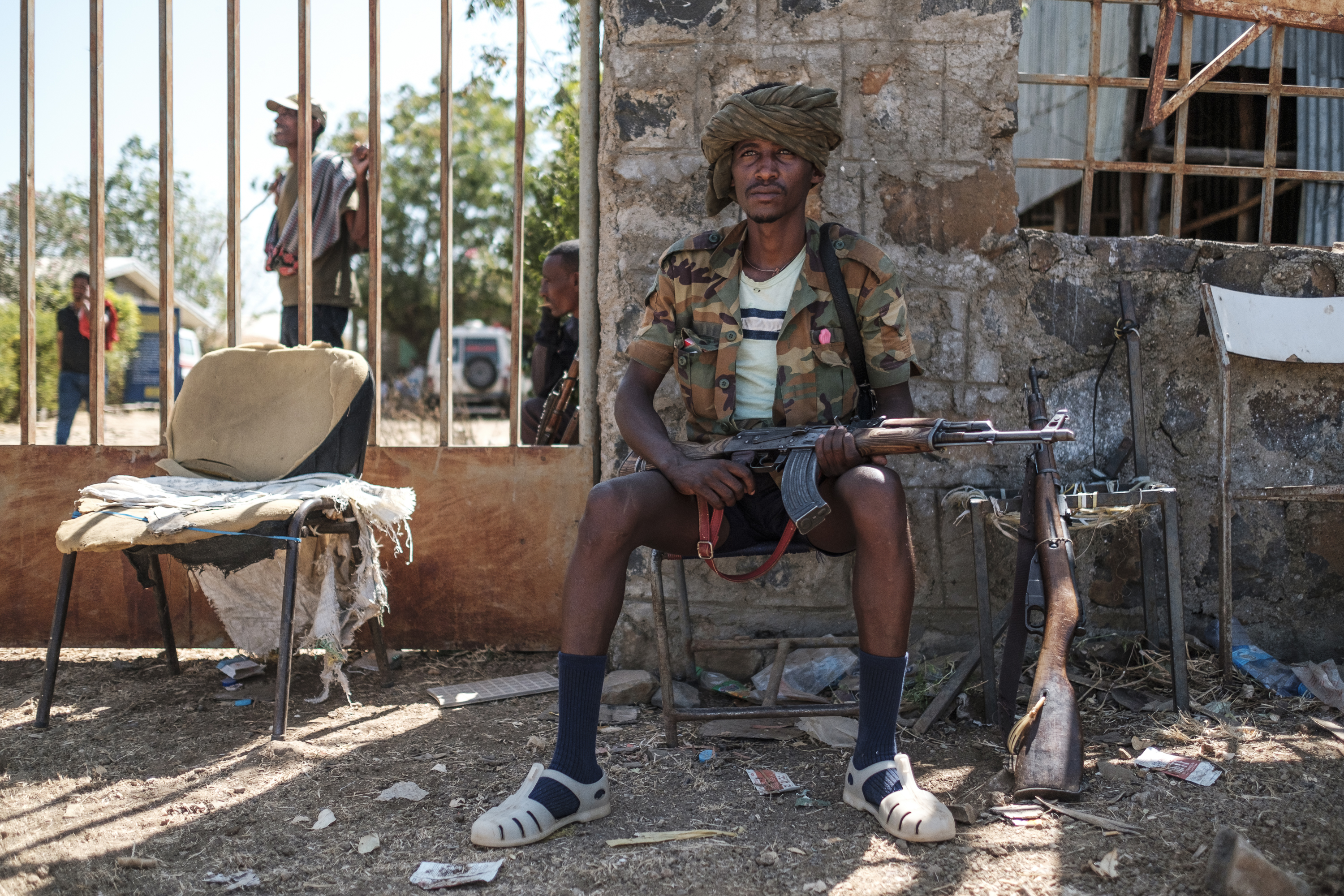 A member of the Amhara militia guards a building in Dansha in November
