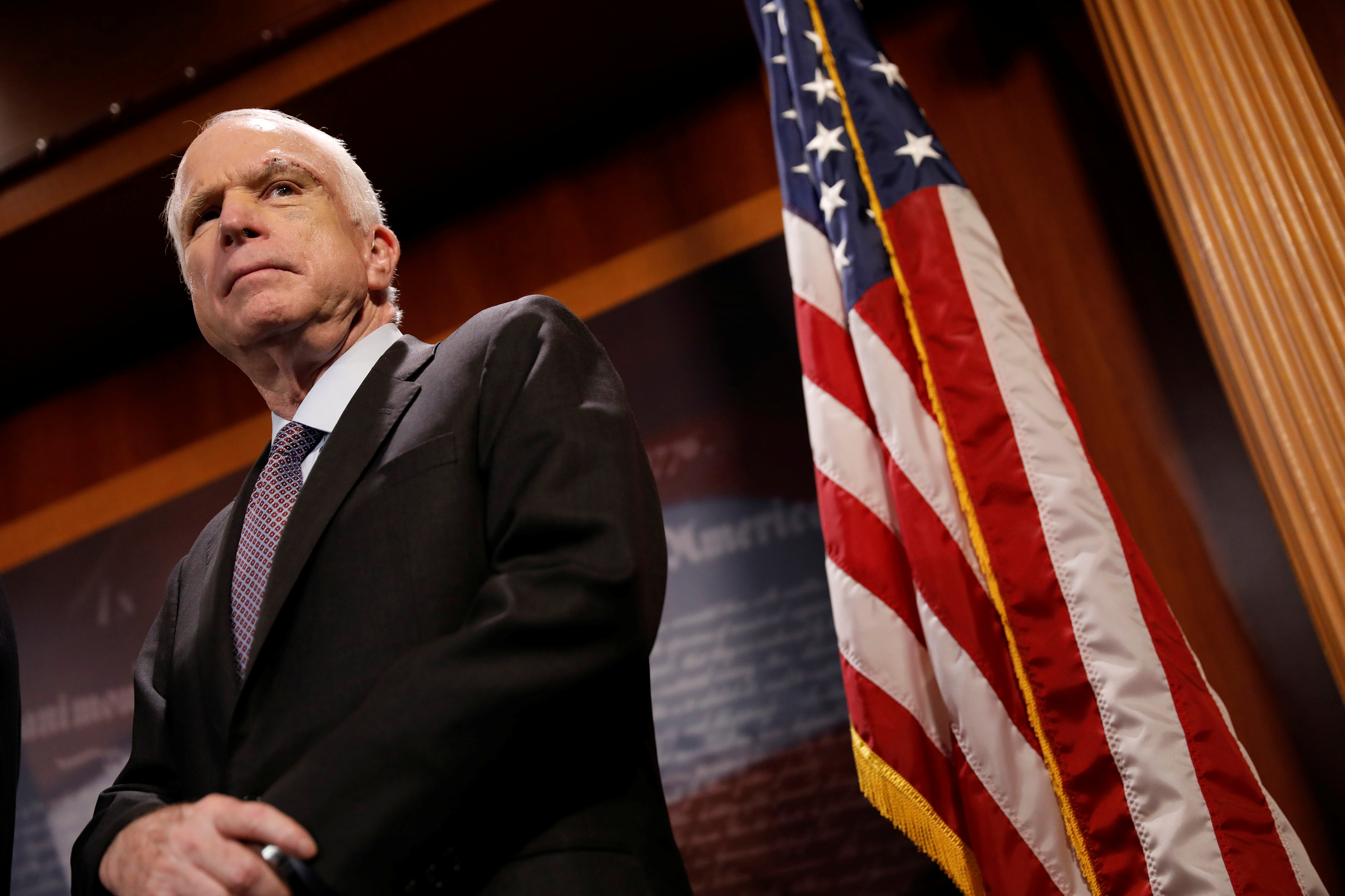 In a July 2017 photo, now-late Republican Senator John McCain looks on during a press conference about his resistance to the so-called “Skinny Repeal” of the ACA