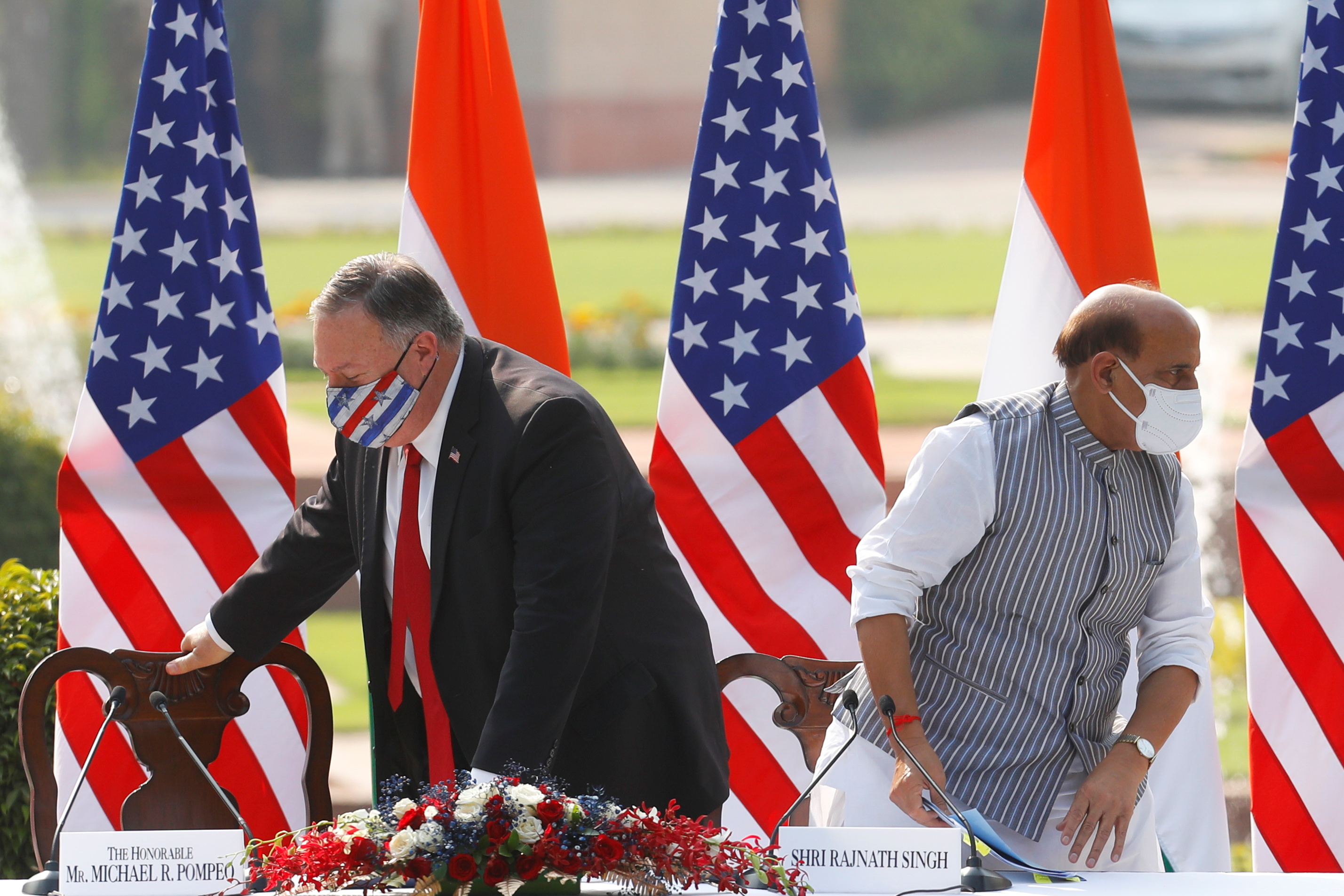 US Secretary of State Mike Pompeo and India’s Defence Minister Rajnath Singh leave after a news conference following their meeting at Hyderabad House