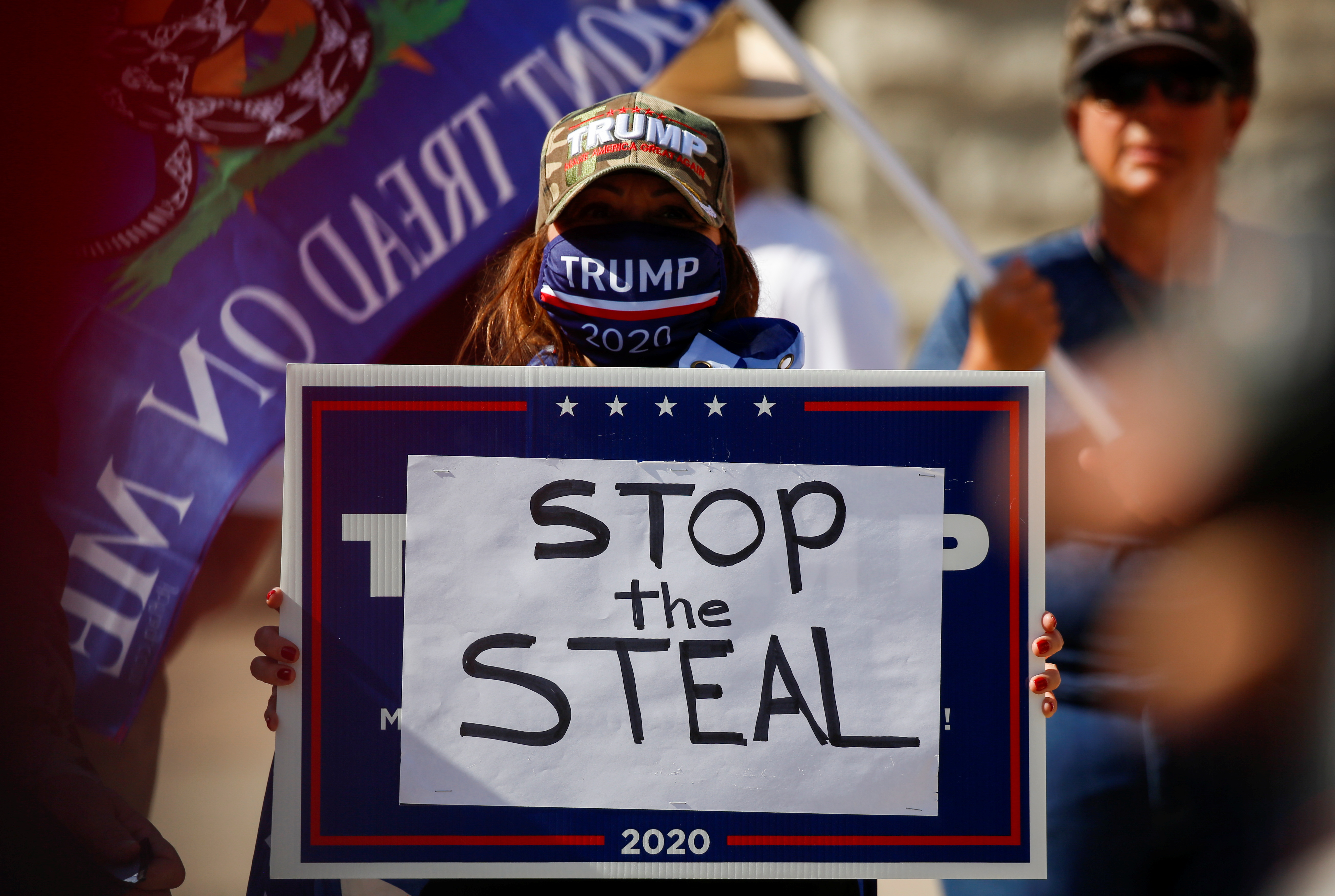 A Trump supporter attends a ‘Stop the Steal’ protest after the 2020 US presidential election was called by the media for Democratic candidate Joe Biden
