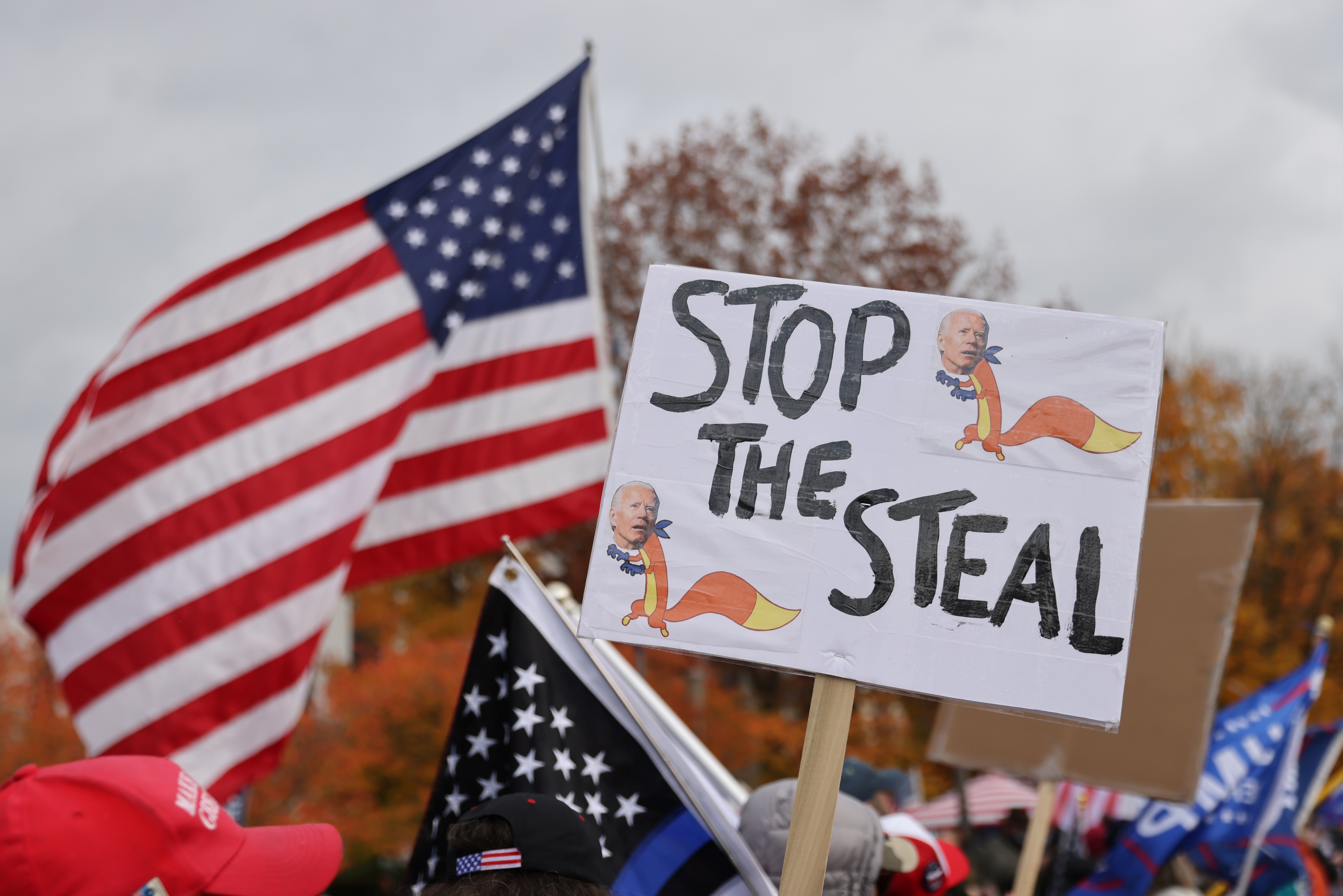 Supporters of United States President Donald Trump have taken to the streets to protest the result of the US presidential election [Goran Tomasevic/Reuters]