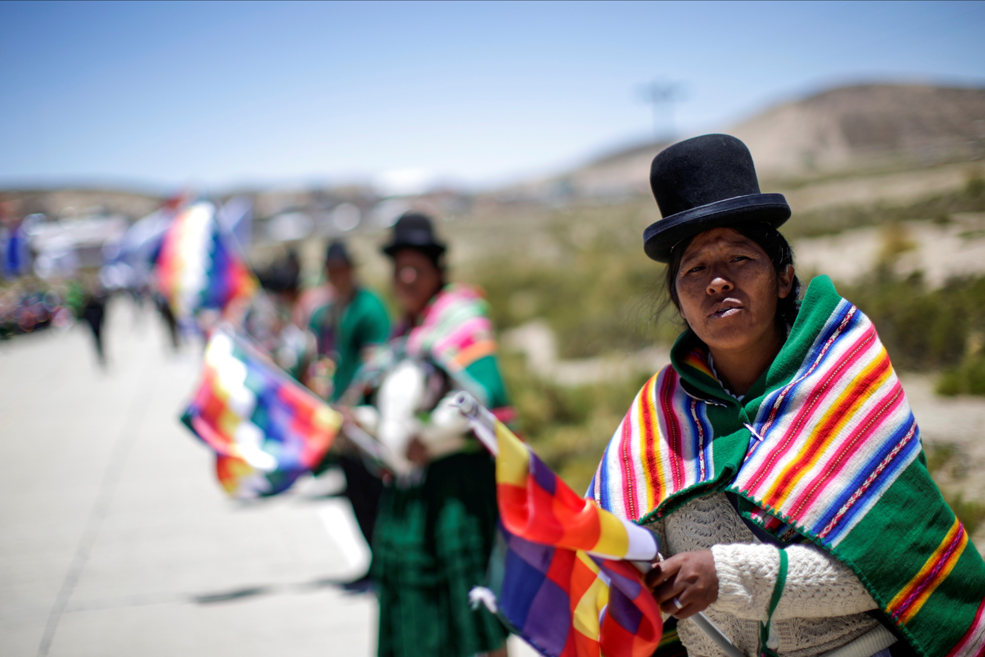 Supporters holding Whipala flags during Bolivia’s former President Evo Morales’s caravan between Uyuni and Oruro, upon his return to the country