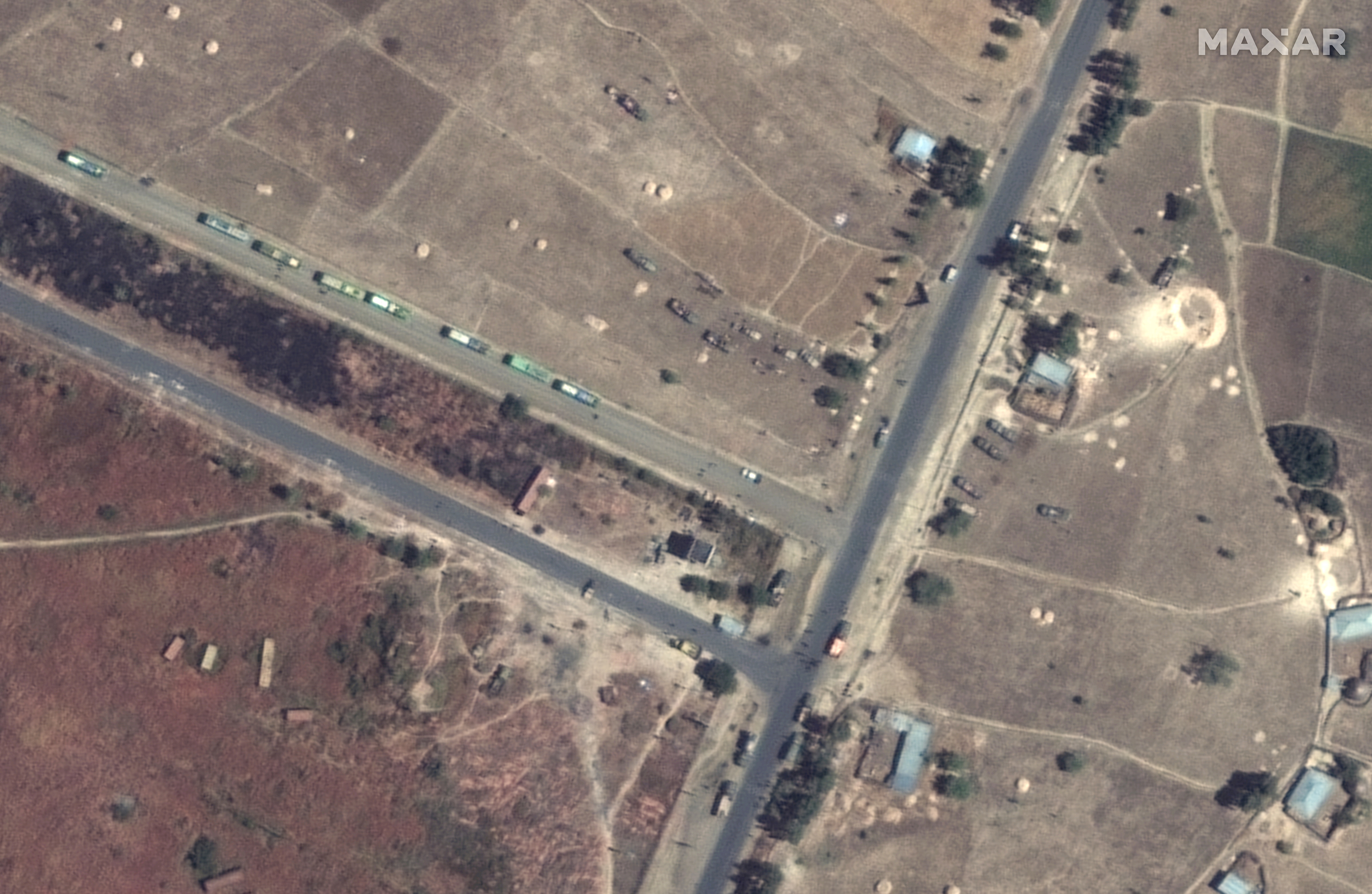 Military vehicles are seen near Axum airport on November 23, 2020, according to a satellite image from Maxar Technologies [Handout via Reuters]
