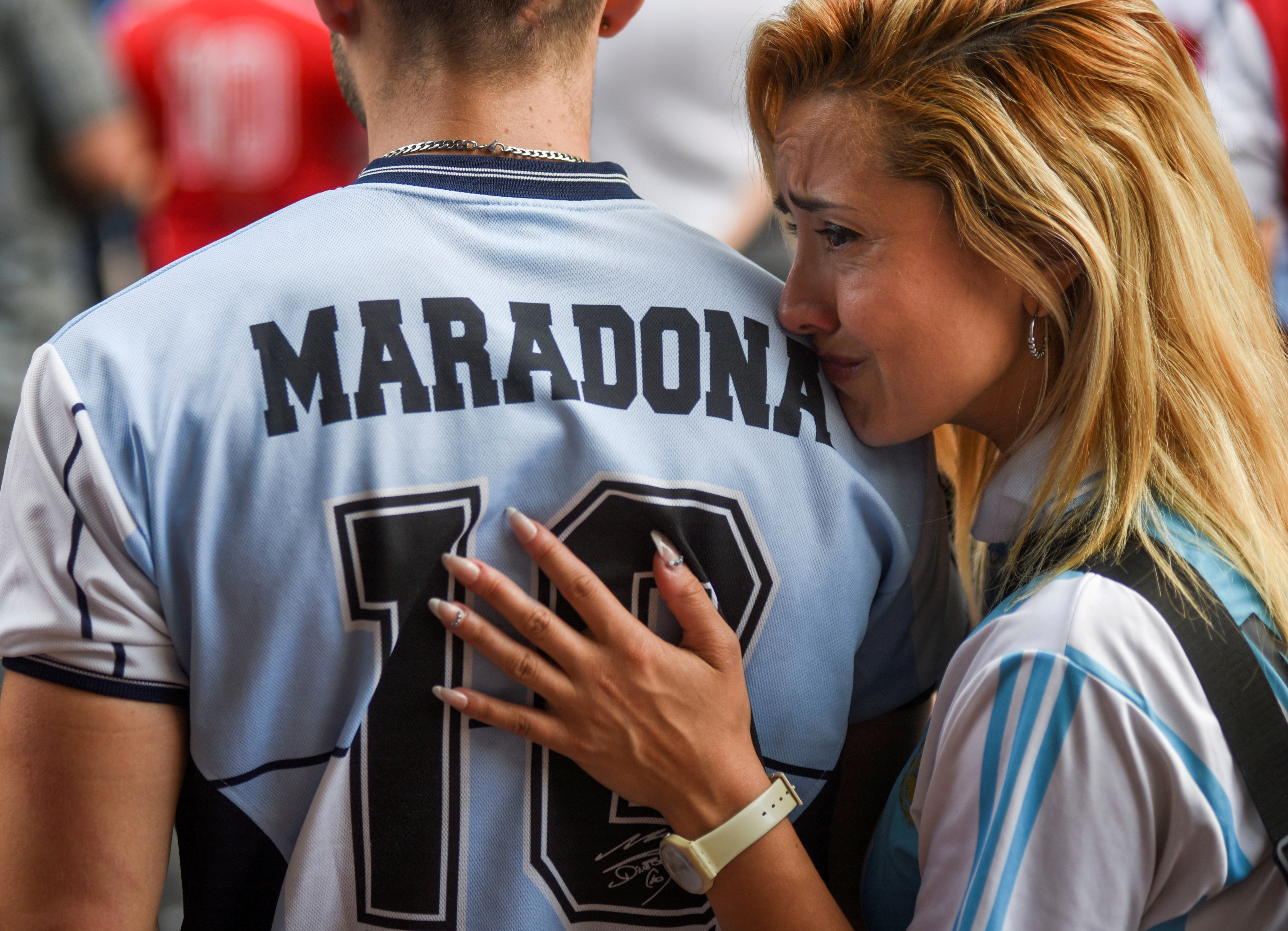 Fans stood forlornly in homage to the Number 10, showing Maradona in his dashing prime