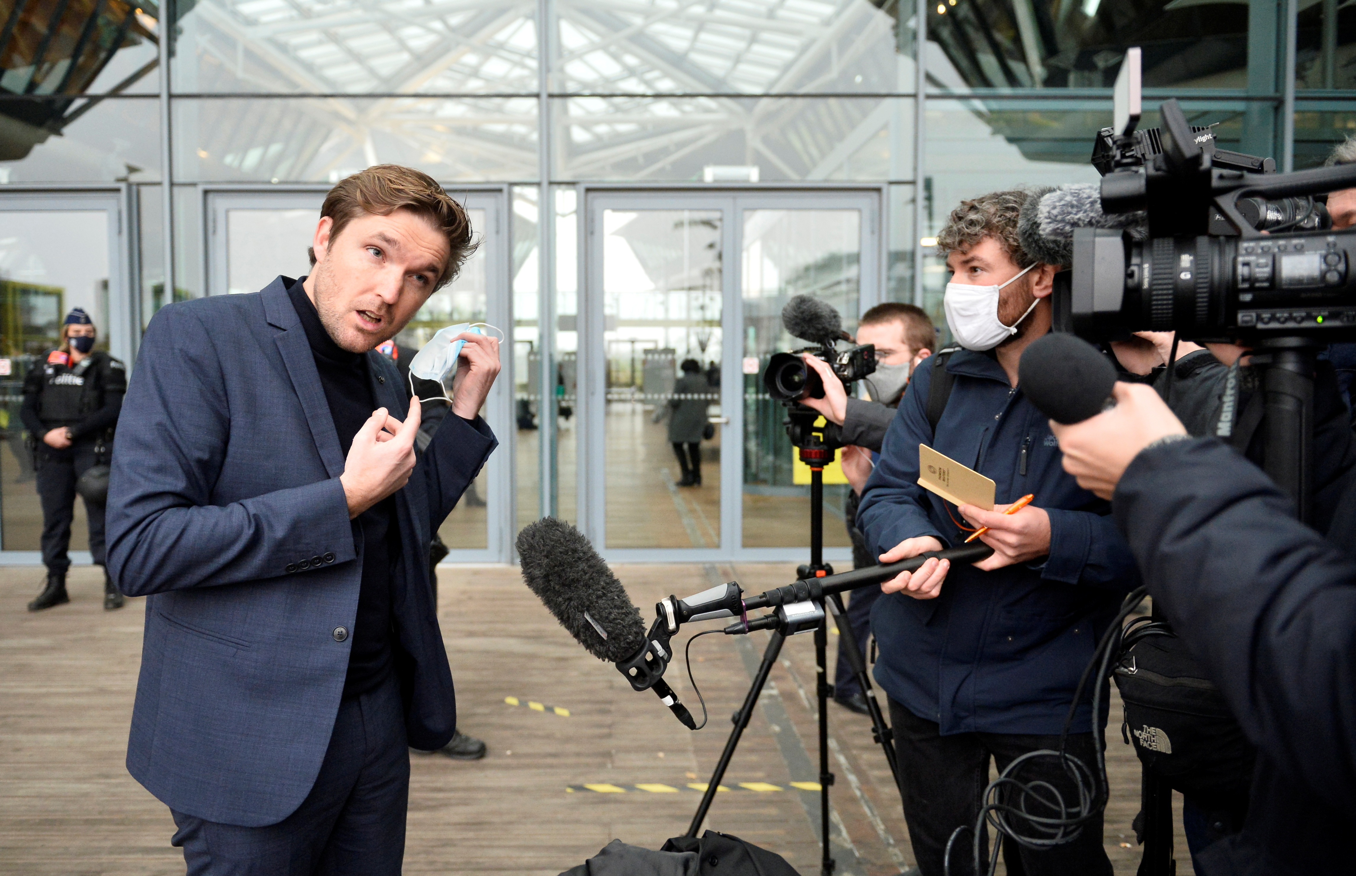 Belgian lawyer Dimitri de Beco, who represents Iranian diplomat Assadollah Assadi, speaks to media as he arrives at the court building in Antwerp, Belgium
