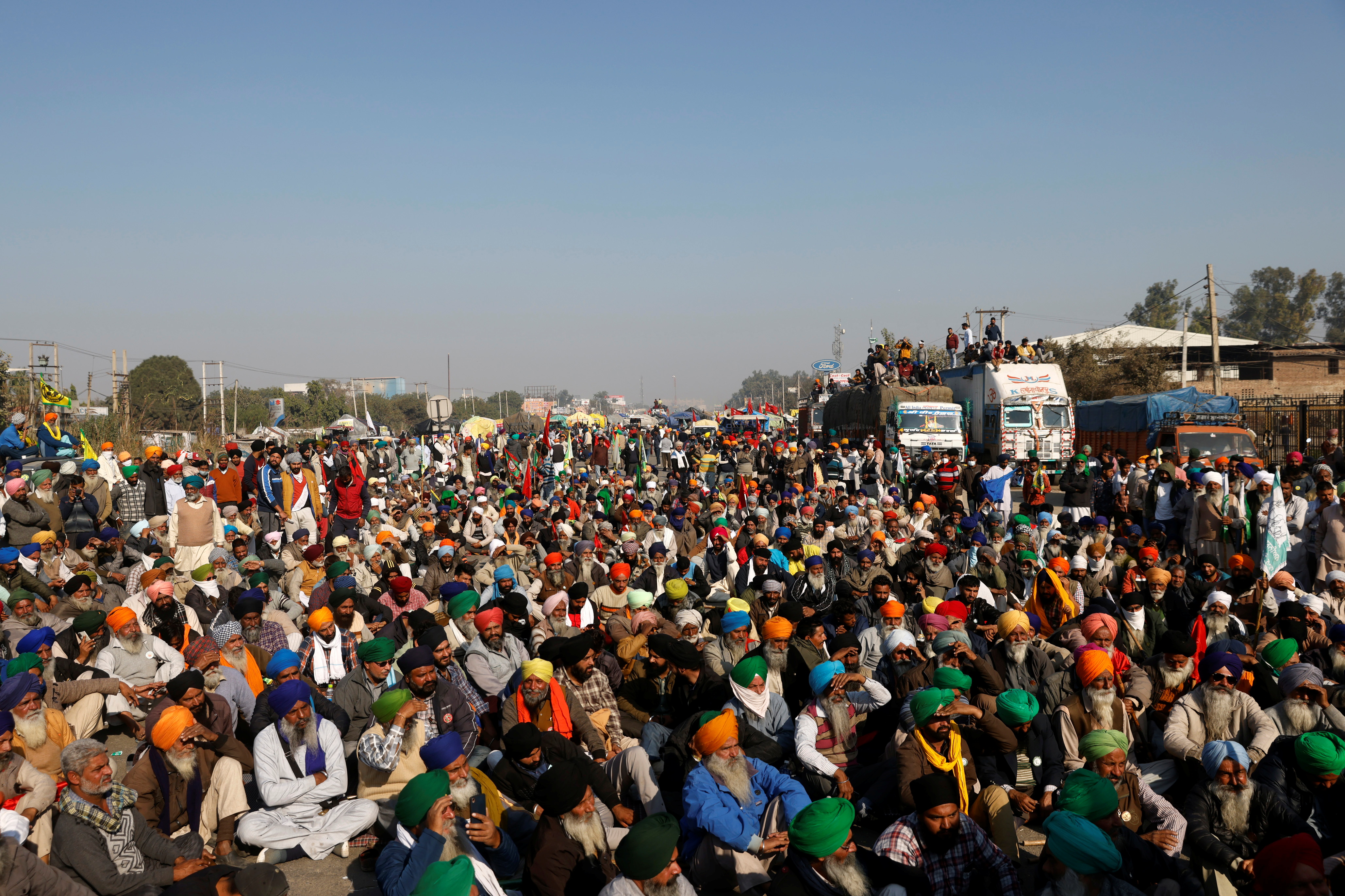 Farmers protest against the newly passed farm bills at Singhu border near New Delhi
