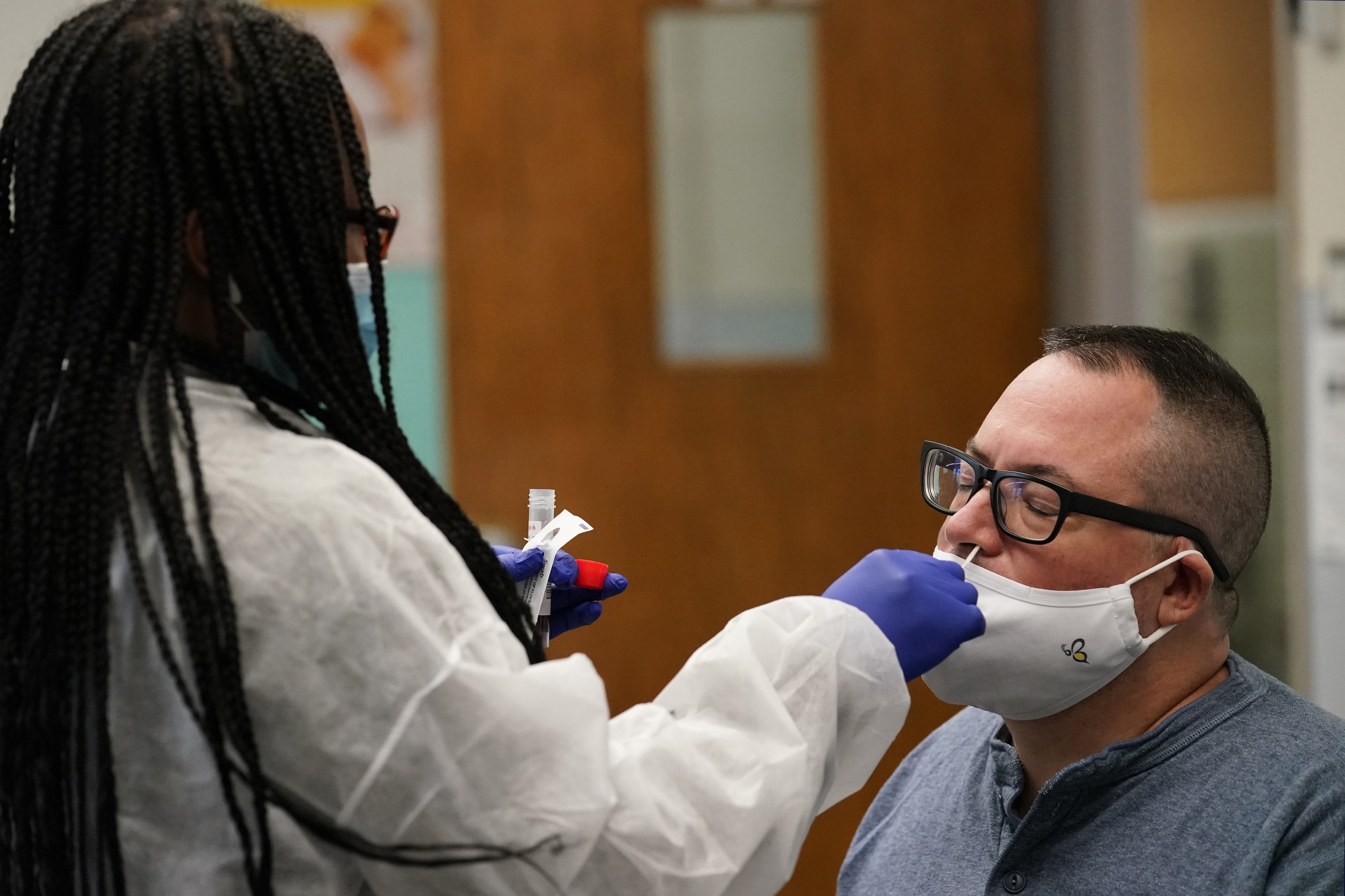 Several US states have seen a surge in COVID-19 infections in recent weeks, prompting them to put new restrictions in place