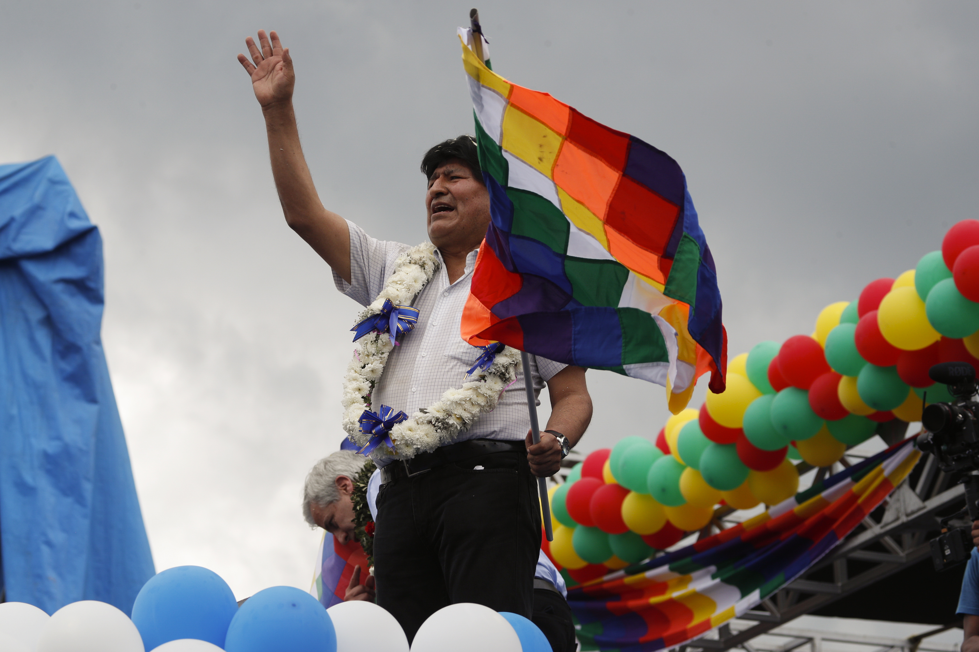 Evo Morales waving during a rally with supporters in Chimore, Cochabamba province, Bolivia