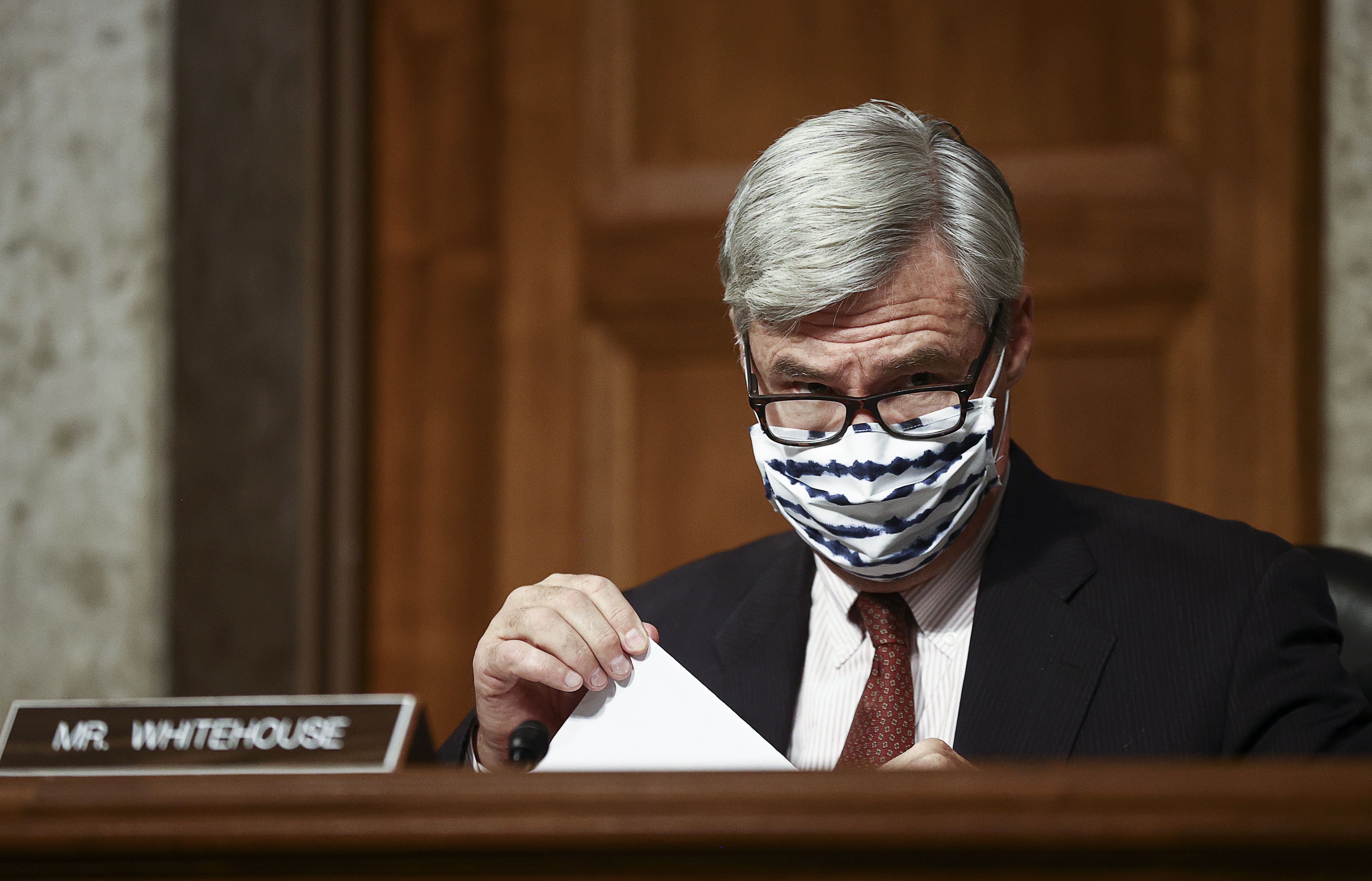 Senator Sheldon Whitehouse listens during a Senate Judiciary Committee hearing on actions taken by Facebook and Twitter during the closely contested election