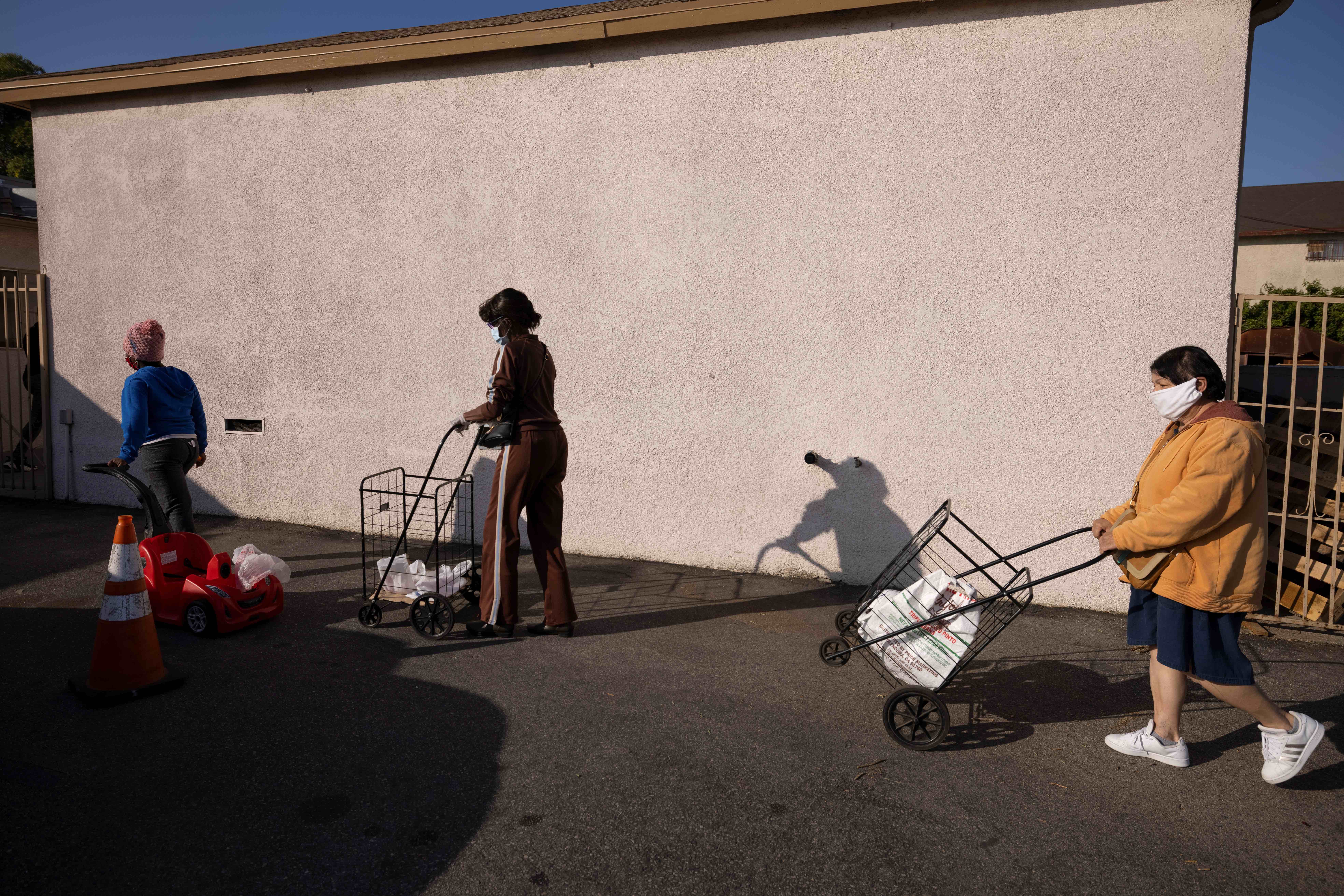 Wall Street has seen record highs even as Main Street struggles. Food banks like the Los Angeles Regional Food Bank have seen a surge in people needing help