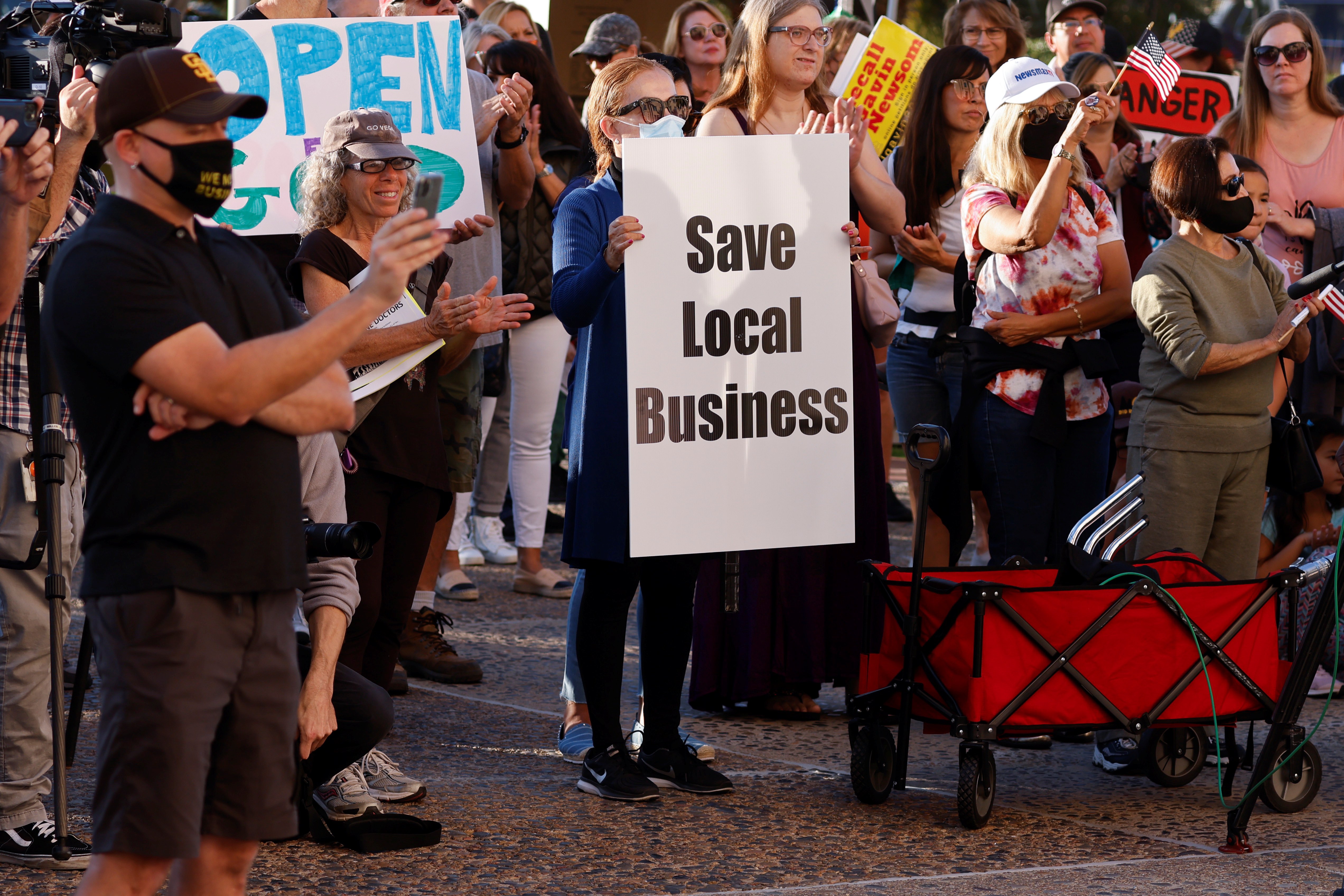 Business owners protest to remain open despite state-mandated restrictions after high case rates placed San Diego County in the most restrictive ‘purple’ tier amid the outbreak of the coronavirus in San Diego, California