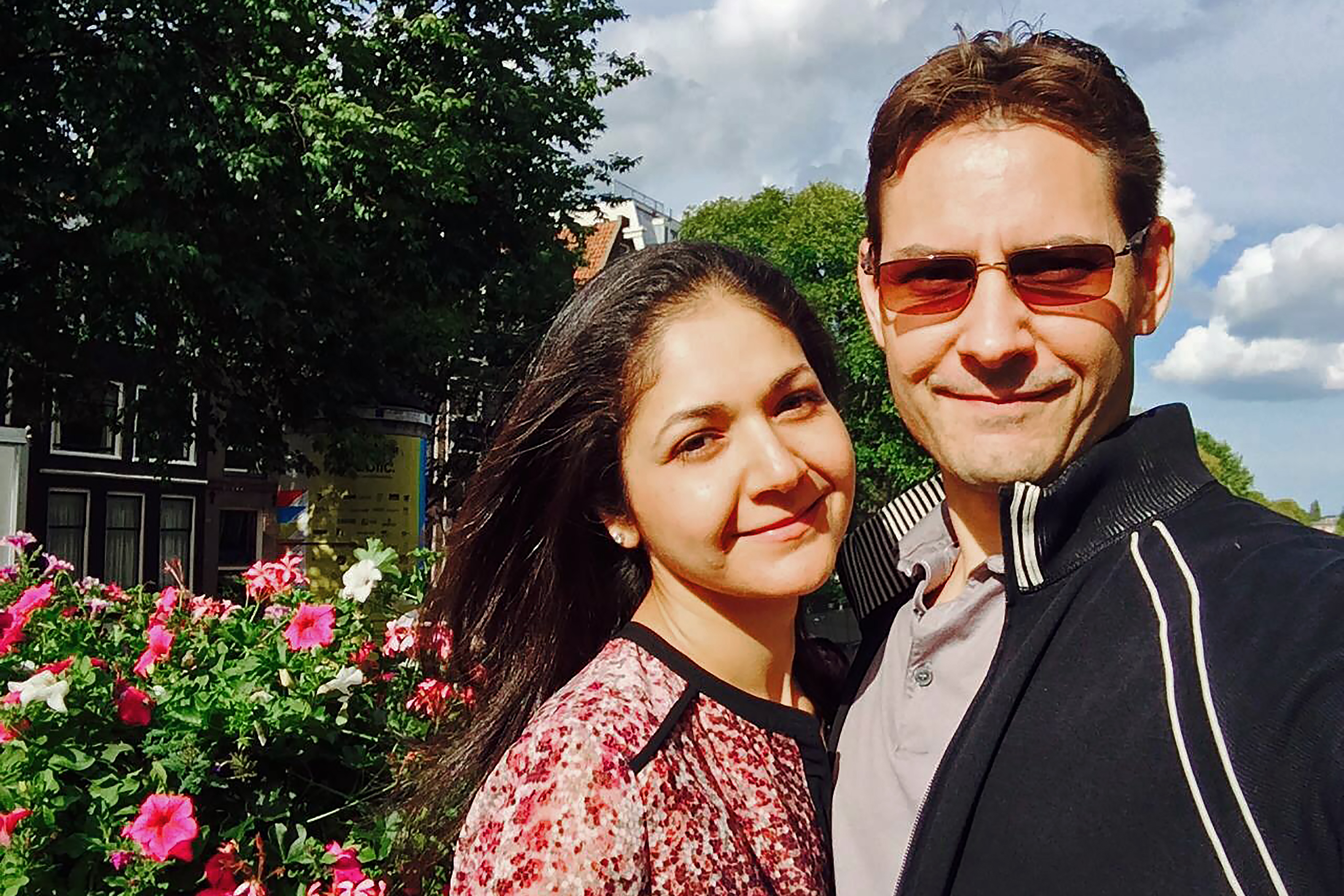 Vina Nadjibulla with her with husband Canadian Michael Kovrig, who has been detained in China for more than two years and is now being tried on charges of spying [Family Photo via AFP]