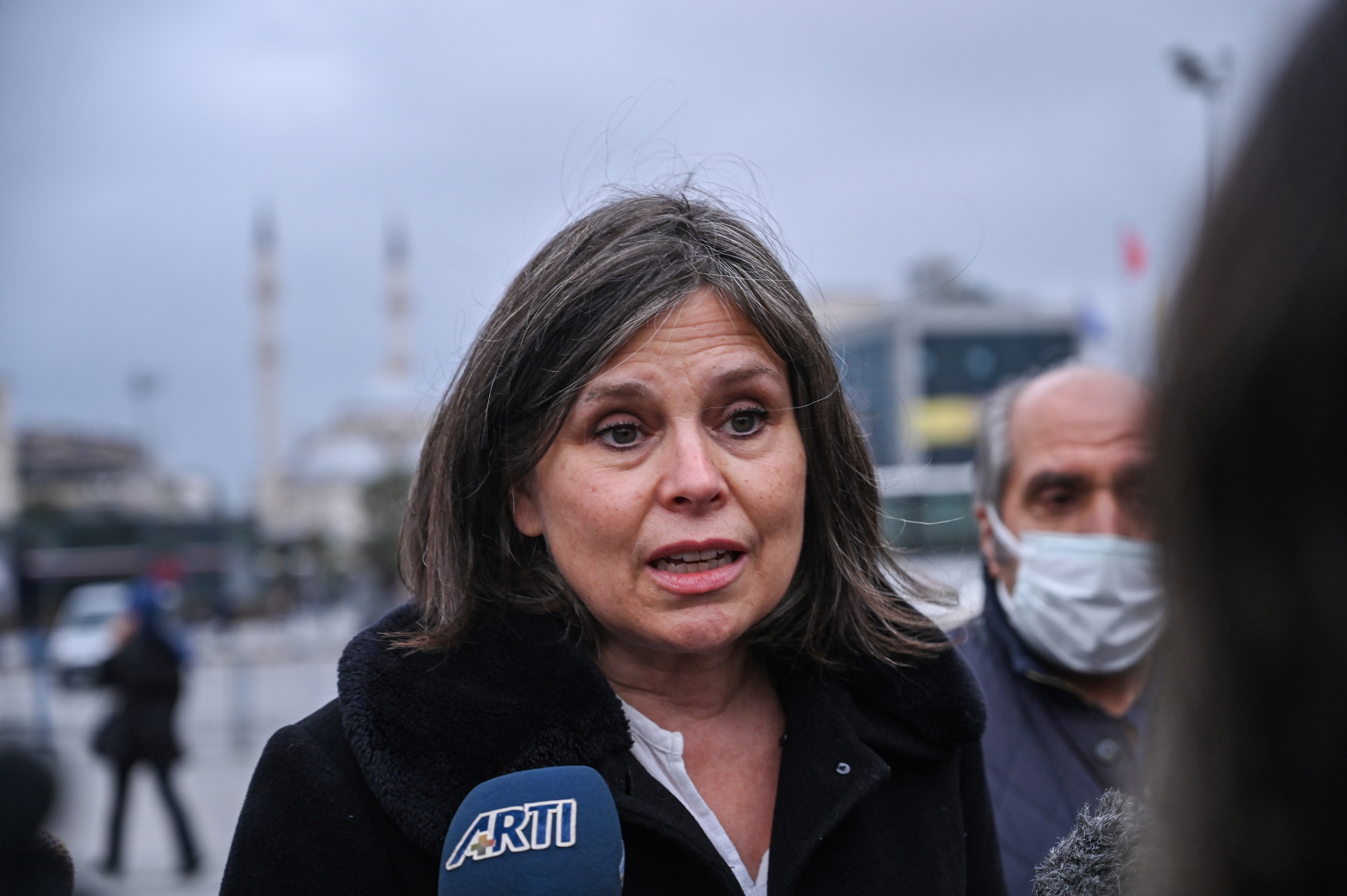 HRW Turkey director Emma Sinclair-Webb talks to the press in Istanbul after a hearing in the trial of Kavala