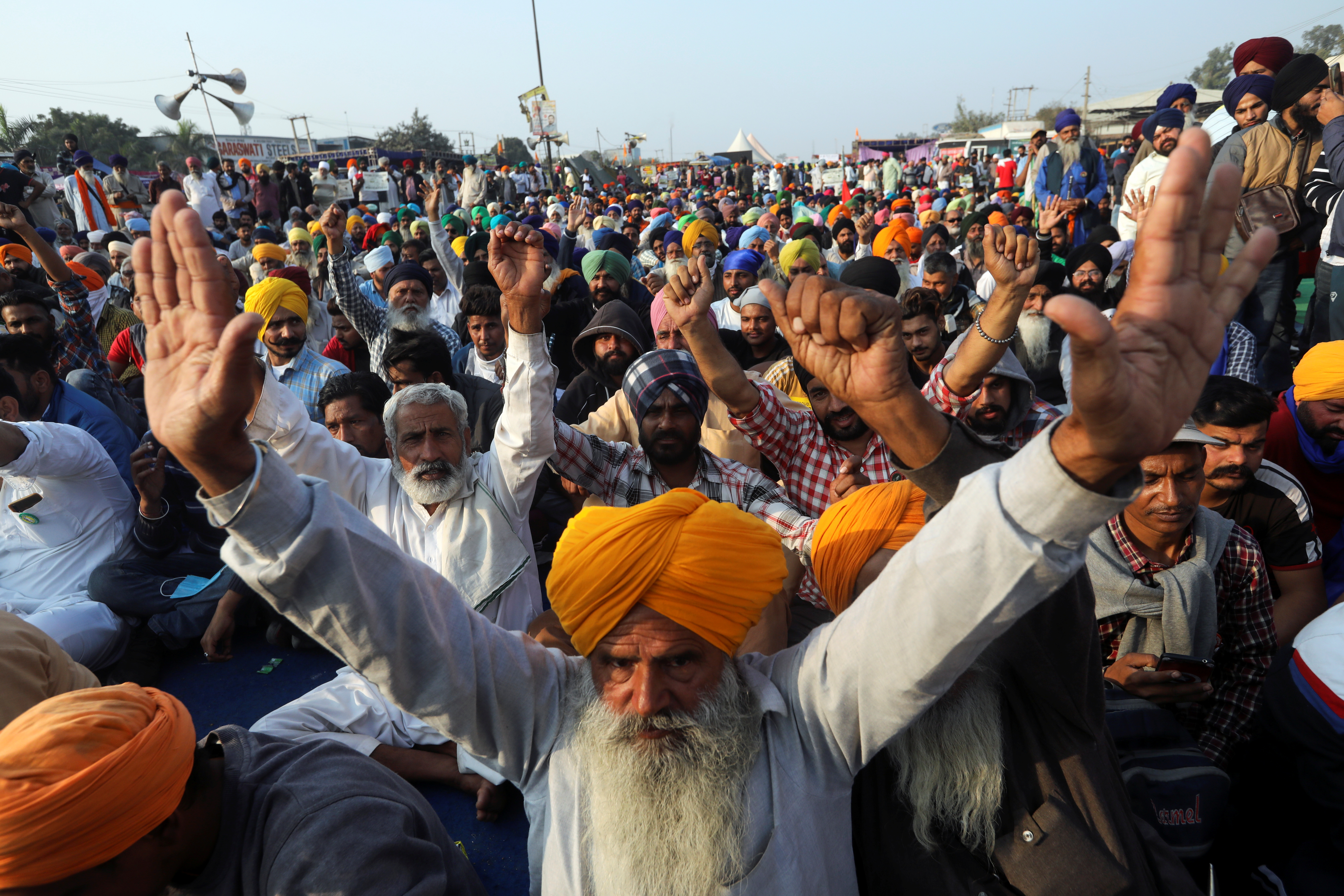 Demonstrators gesture during a protest against the newly passed farm bills at Singhu border near New Delhi, India, December 10, 2020