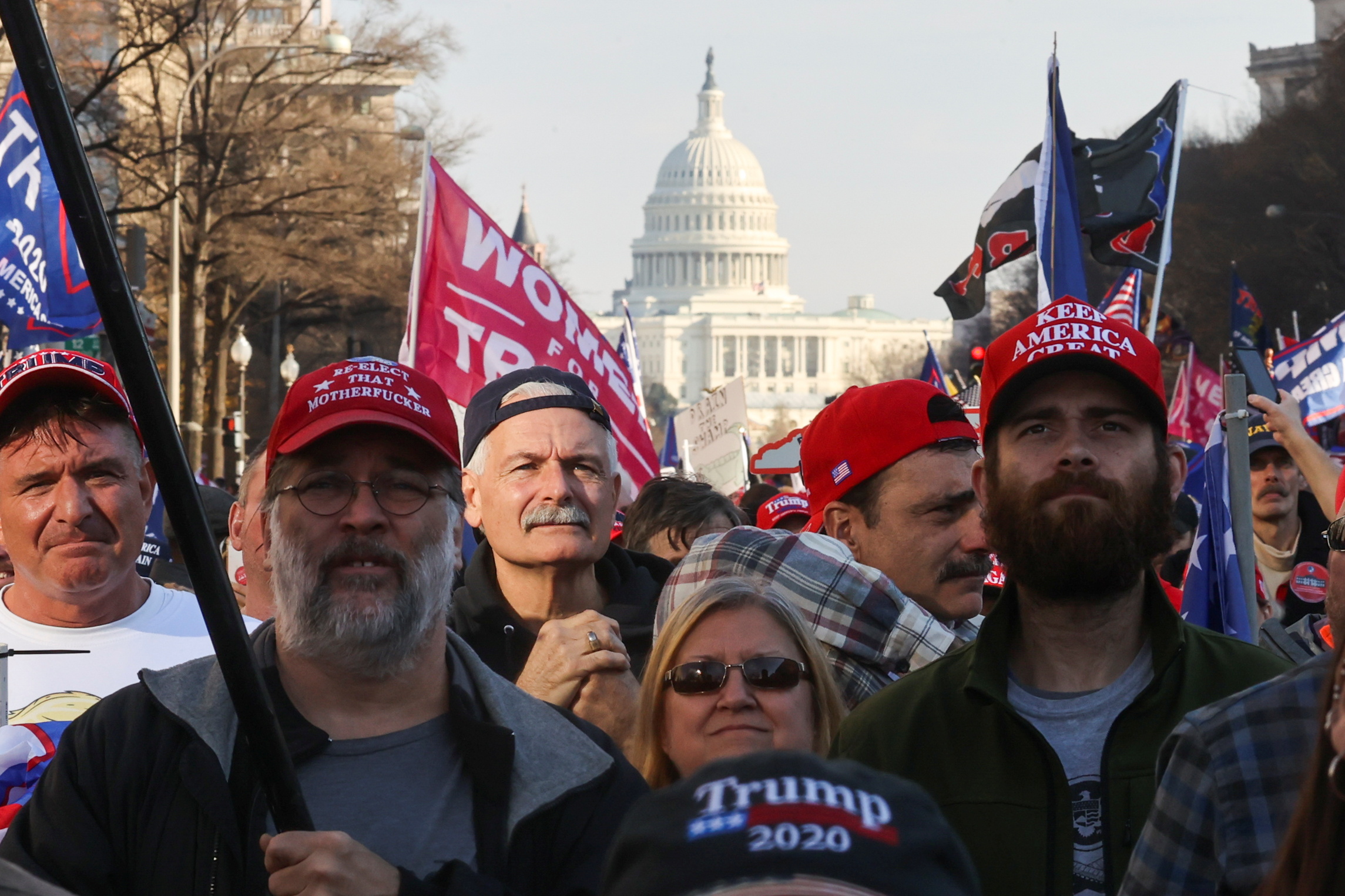 Supporters of US President Donald Trump take part in a rally to protest the results of the election, in Washington, DC, on December 12 [Jonathan Ernst/Reuters]