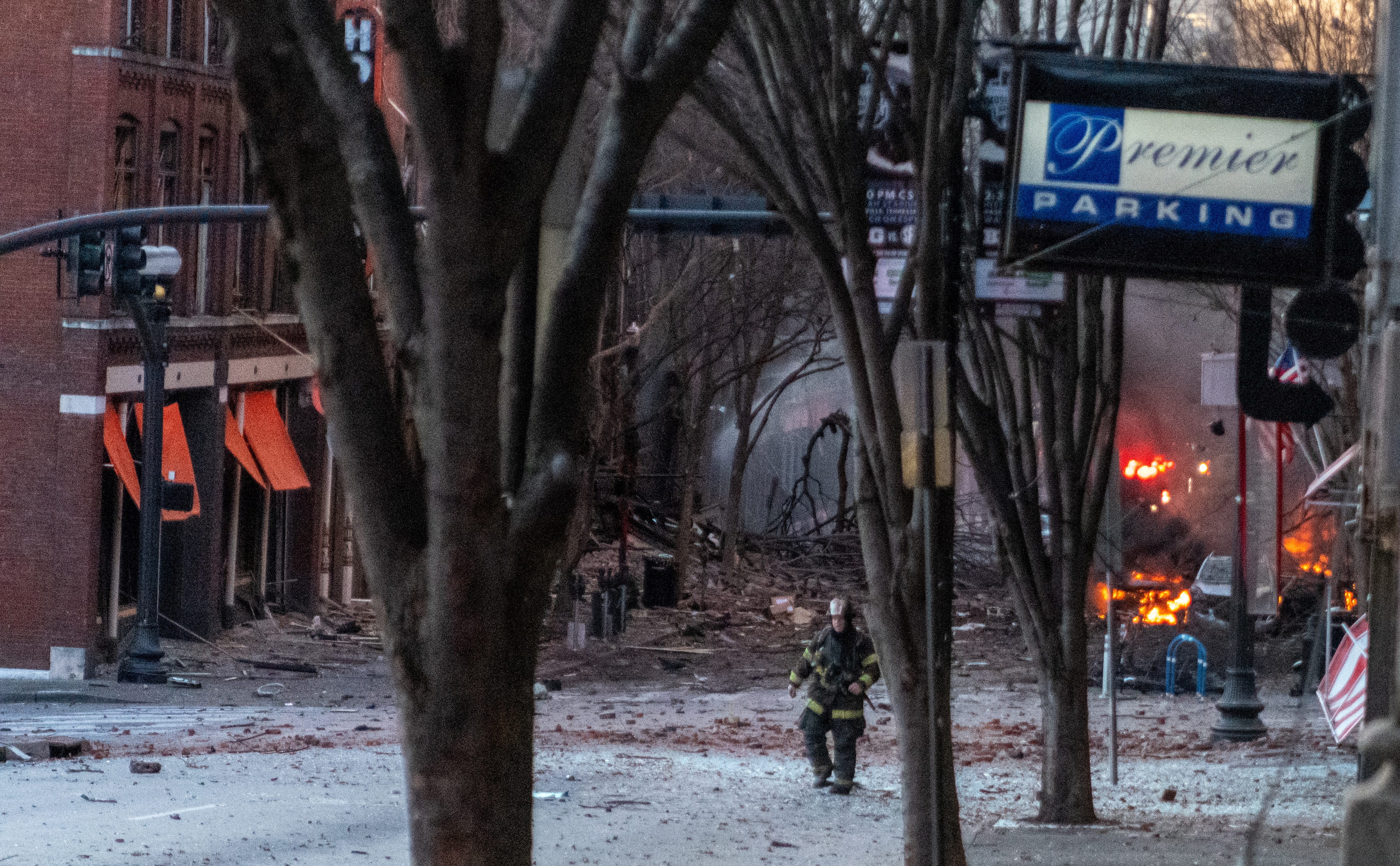 Debris litters the road near the site of an explosion in the area of Second and Commerce in Nashville