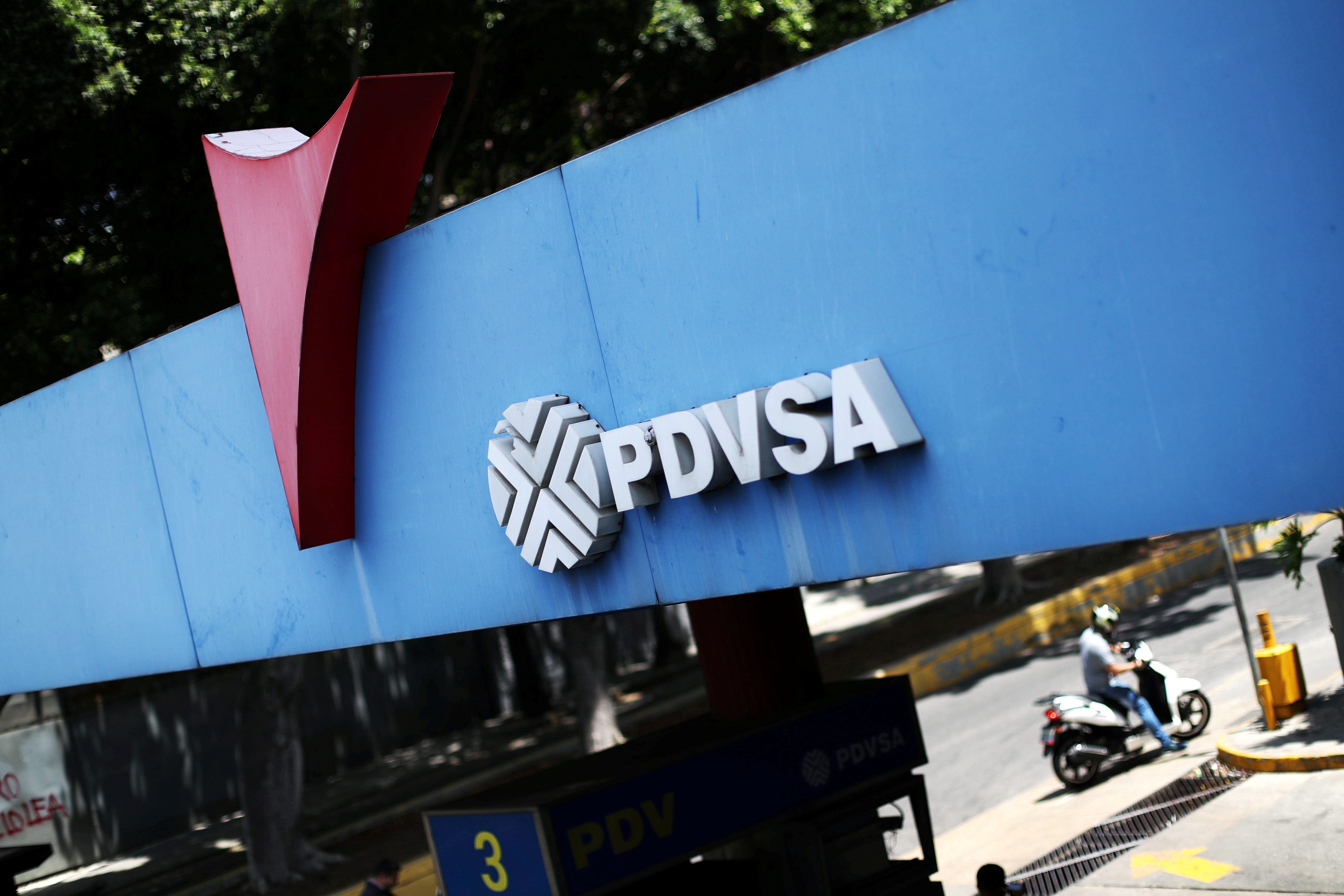 A state oil company PDVSA’s logo is seen at a gas station in Caracas, Venezuela