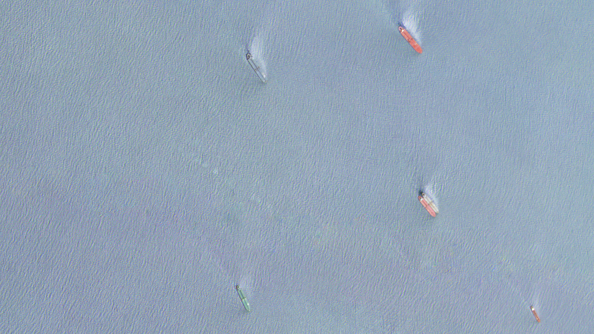 Satellite image captured by Planet Labs and verified by TankerTrackers.com, shows Alastayir oil tanker (green, top) in a position to conduct a ship-to-ship transfer of crude with the Afra Royal oil tanker (bottom, red) in the Straits of Malacca, Malaysia