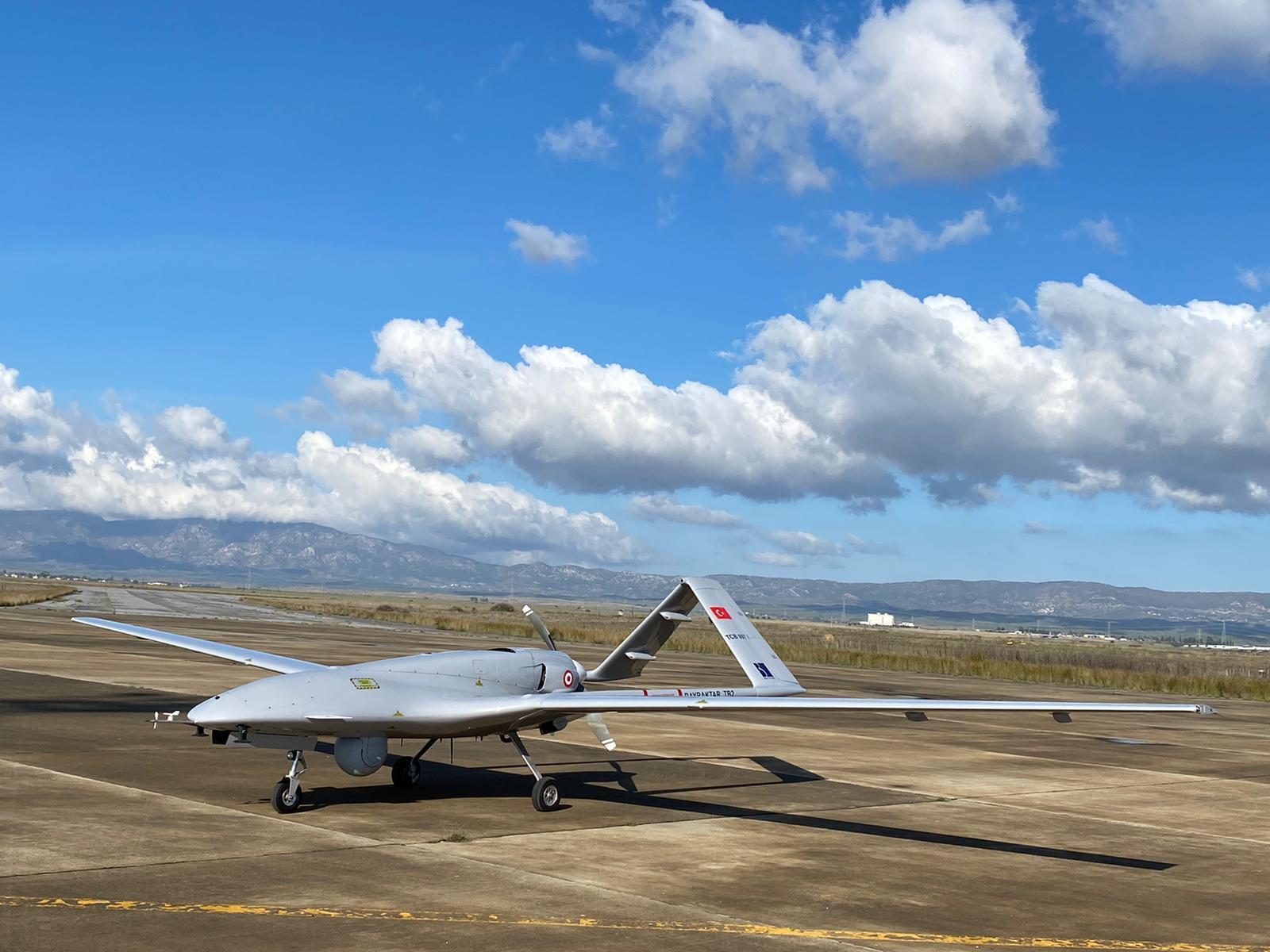 A Turkish-made Bayraktar TB2, a medium-altitude long-endurance unmanned combat aerial vehicle, is seen shortly after its landing at an airport in Cyprus [DHA via AP]