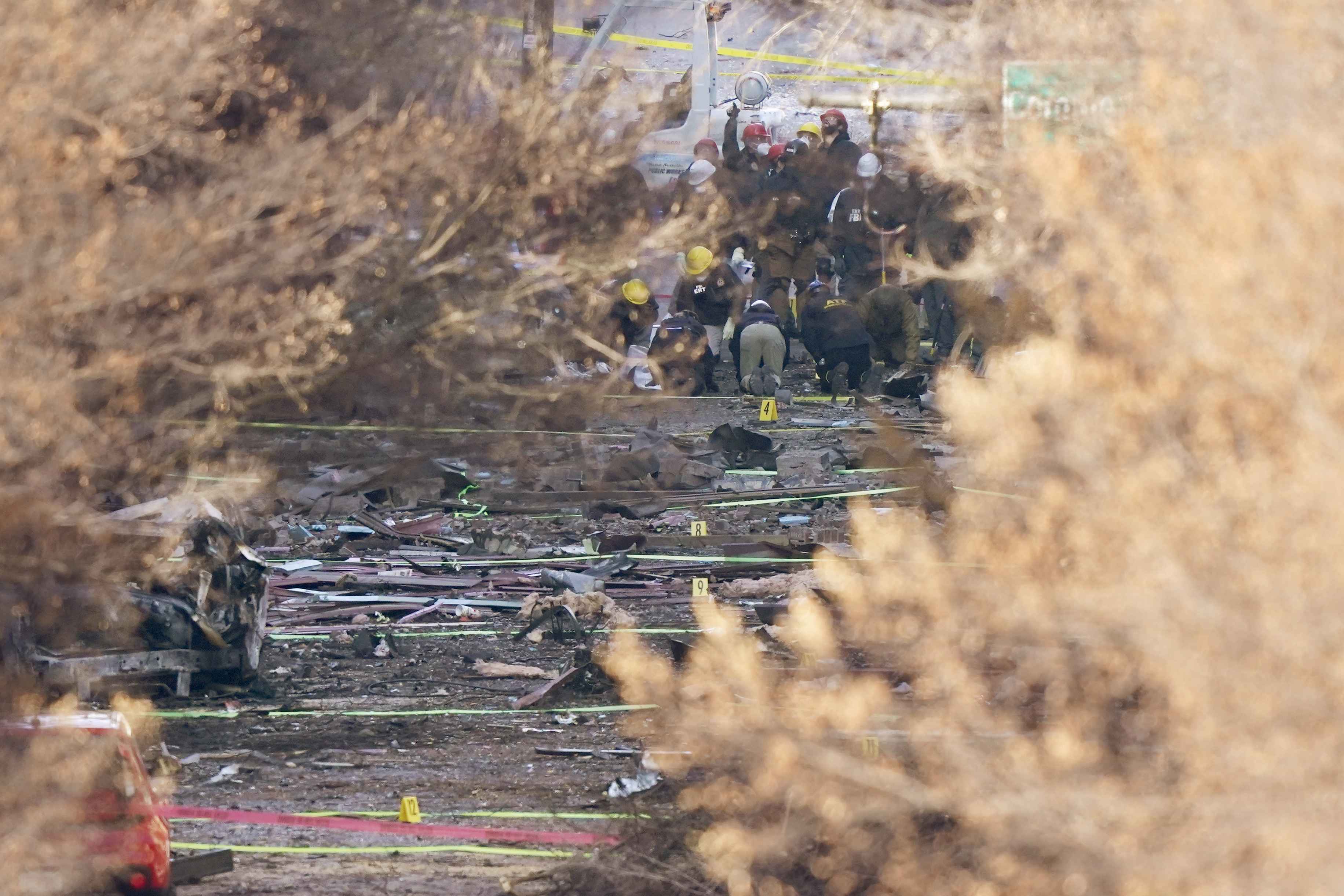 Federal officials are working to piece together the motive behind the Christmas Day explosion that severely damaged dozens of downtown Nashville, Tennessee buildings and injured three