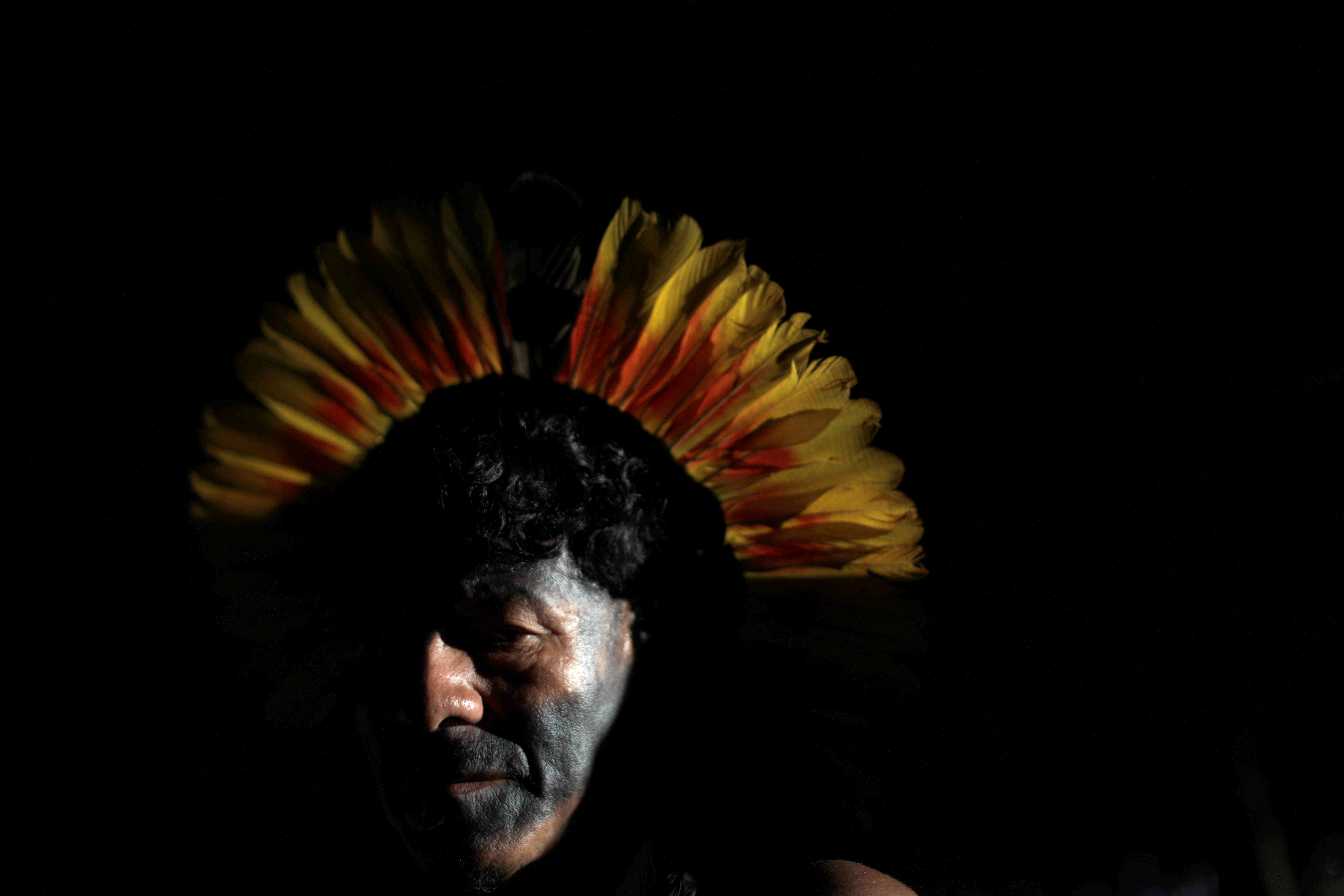 An Indigenous man of Enawene-nawe tribe, is pictured during a four-day pow wow in Piaracu village, Xingu