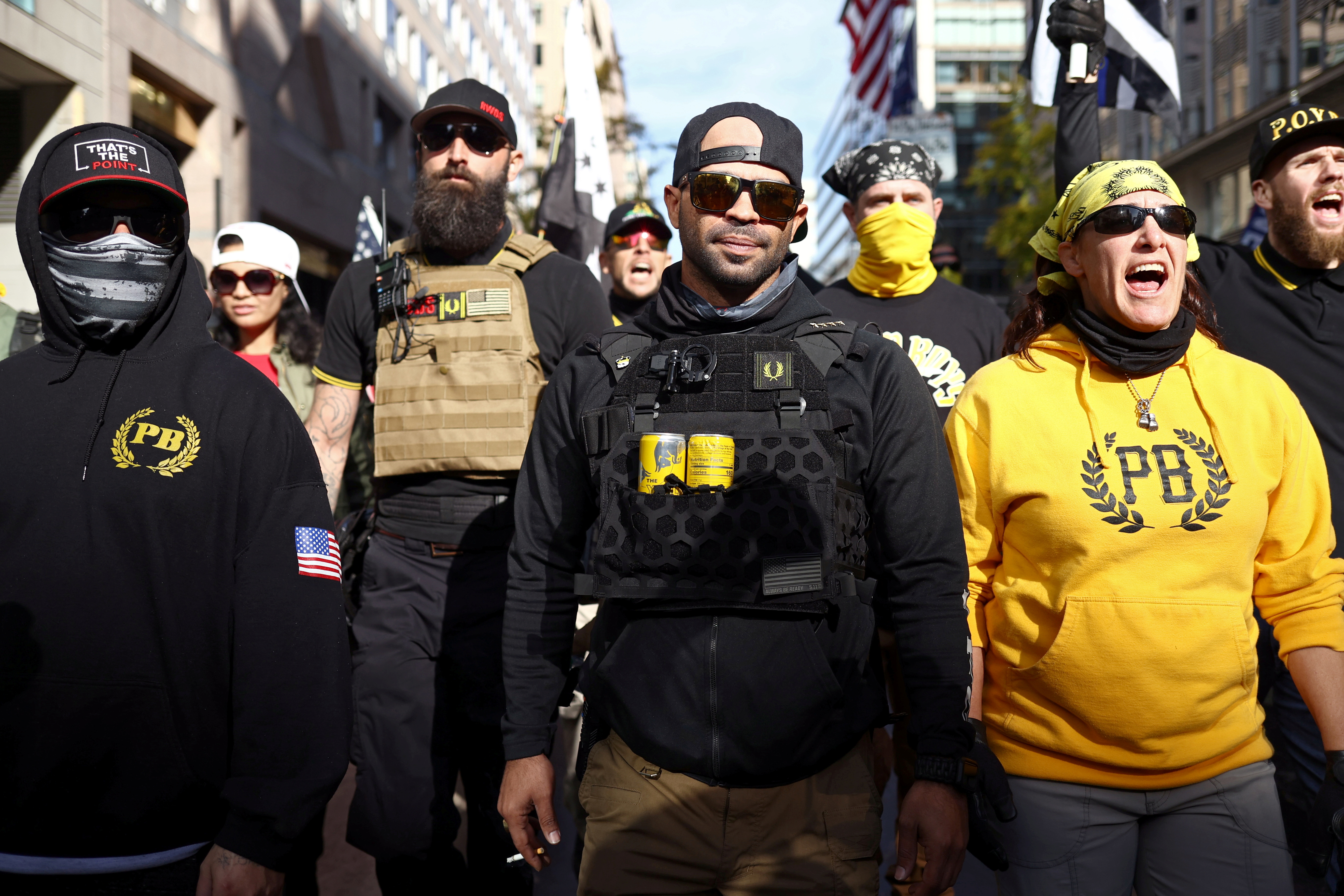 Members of the far-right Proud Boys rally in support of US President Donald Trump to protest against the results of the 2020 US presidential election, in Washington, DC, on November 14, 2020 [Hannah McKay/Reuters]