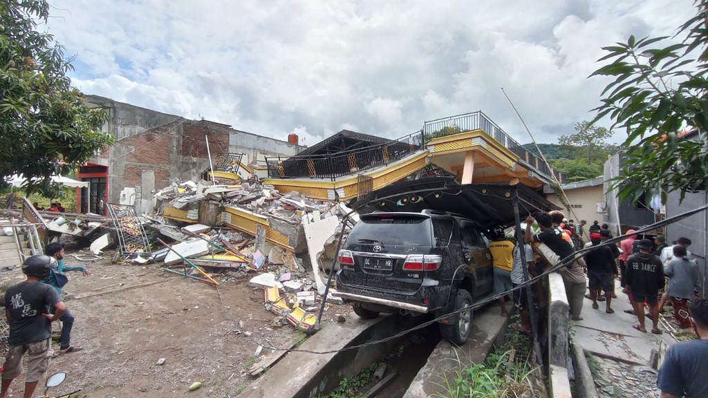 The Indonesian Red Cross said it was rushing medical and relief supplies to Western Sulawesi, with its teams working to help find trapped residents