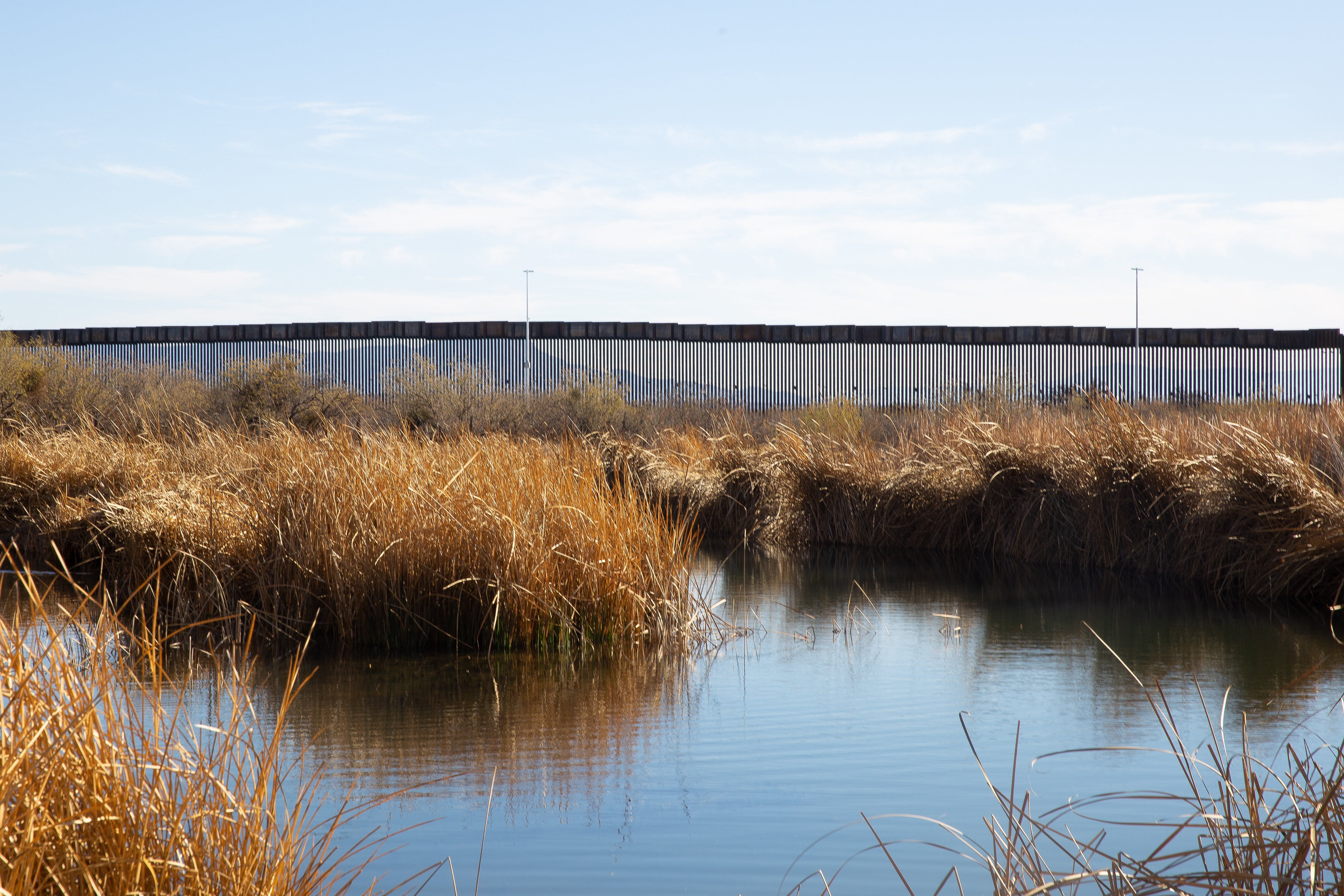 A newly constructed border barrier runs through the San Bernardino National Wildlife Refuge in southeast Arizona on January 8, 2021