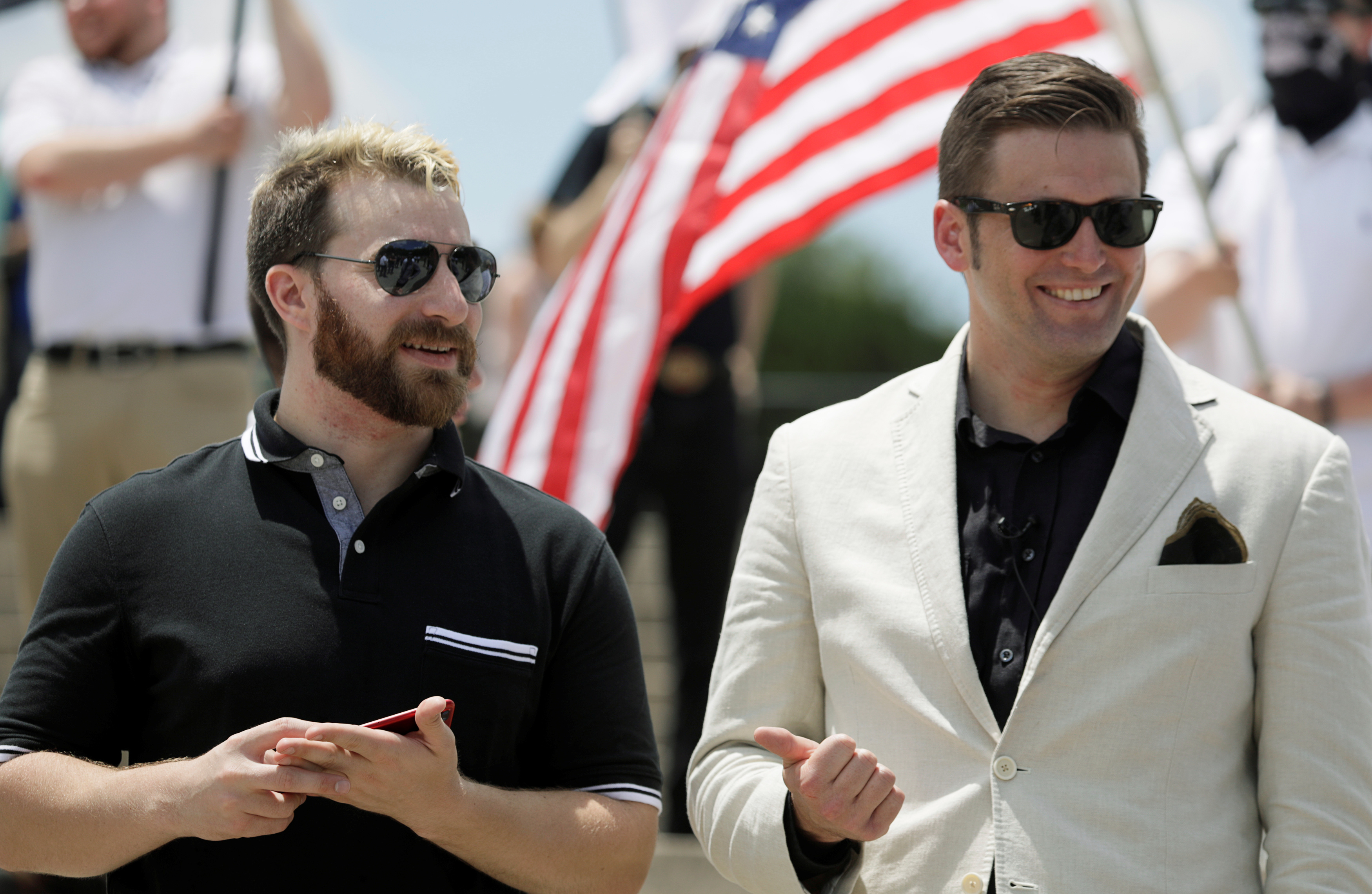Activist Tim Gionet, who goes by the name ‘Baked Alaska’ online, talks with white nationalist leader Richard Spencer, as self-proclaimed white nationalists and ‘Alt-Right’ supporters attend a rally in Washington, DC on June 25, 2017