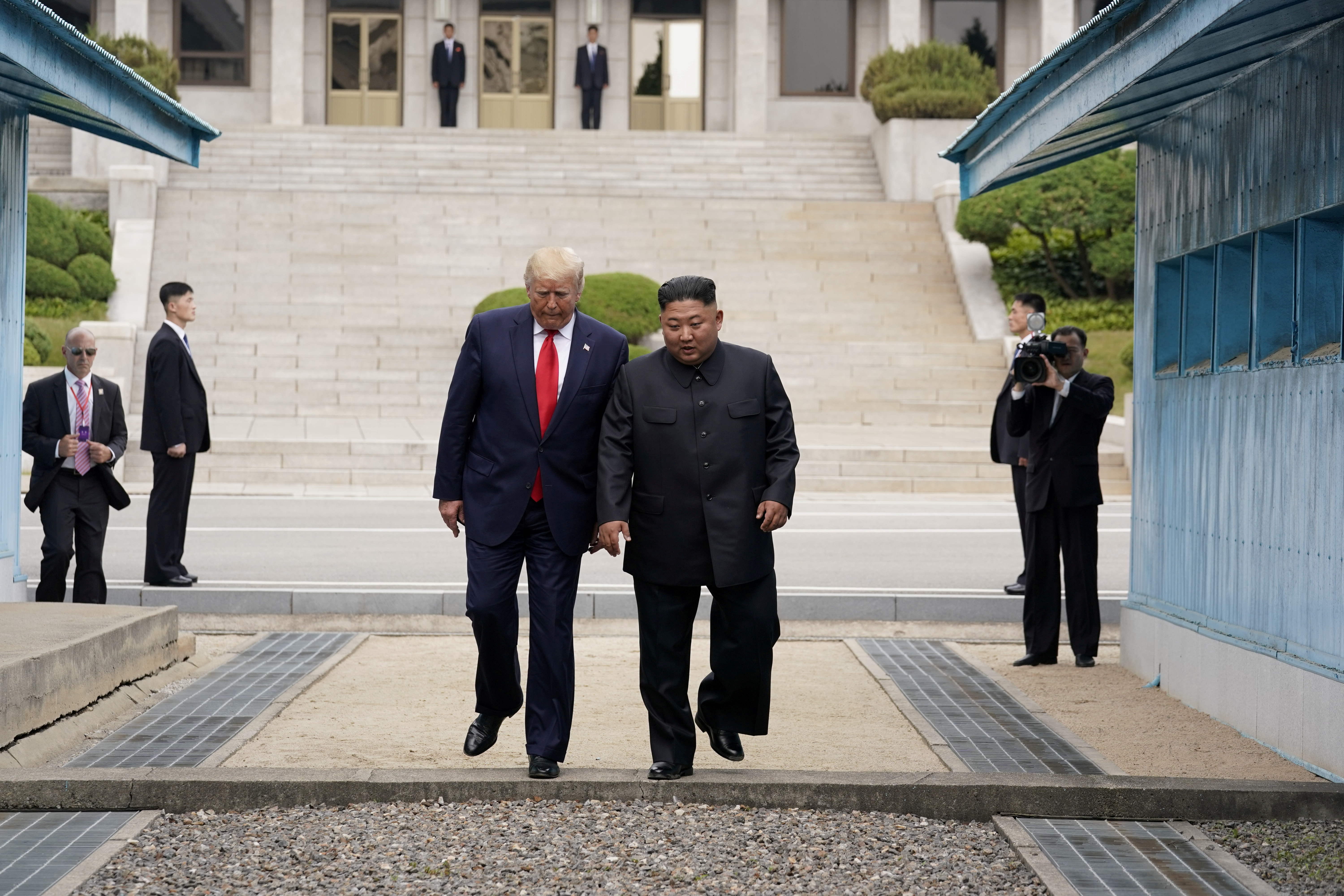 U.S. President Donald Trump meets with North Korean leader Kim Jong Un at the demilitarised zone separating the two Koreas, in Panmunjom, South Korea, June 30, 2019