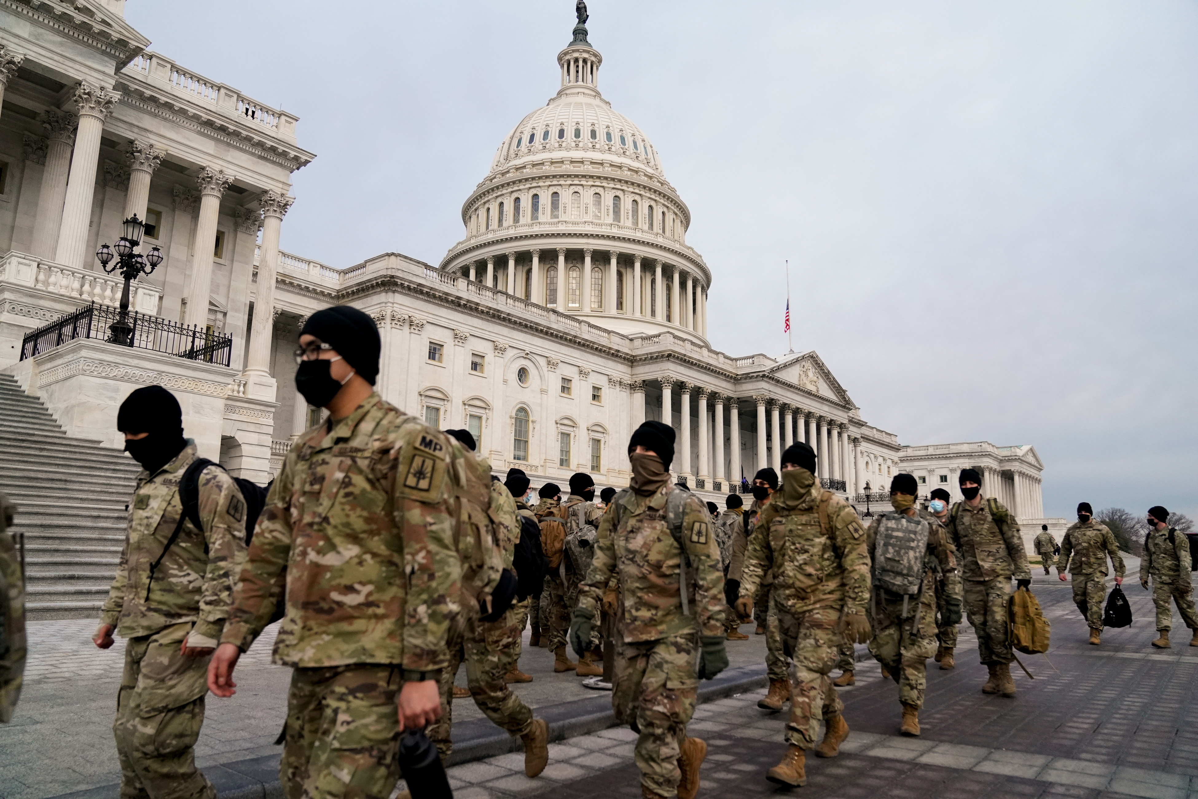 Members of a National Guard military arrive at the US Capitol days after supporters of President Donald Trump stormed the Capitol in Washington on January 11, 2021