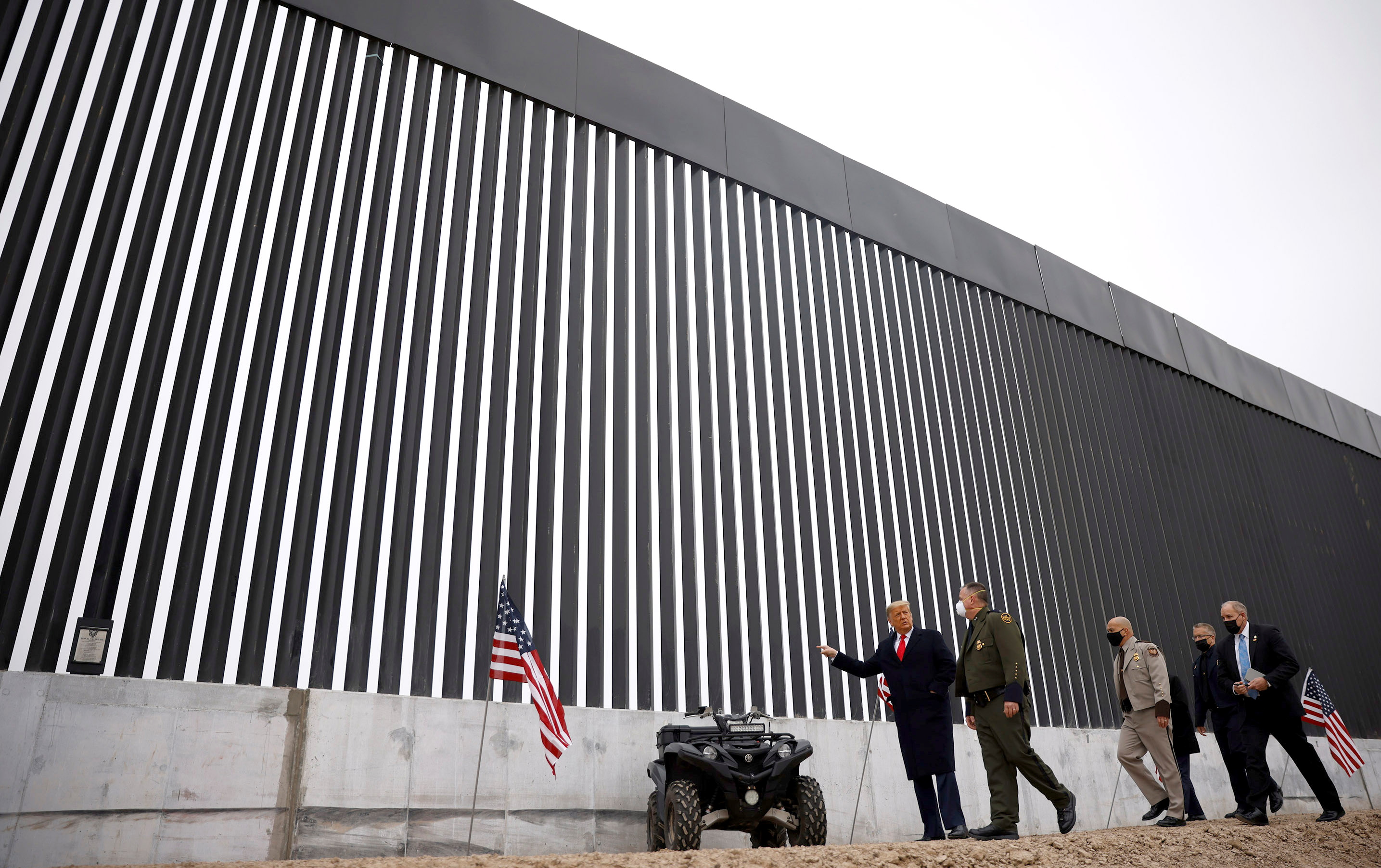 US President Donald Trump visits the US-Mexico border wall in Alamo, Texas